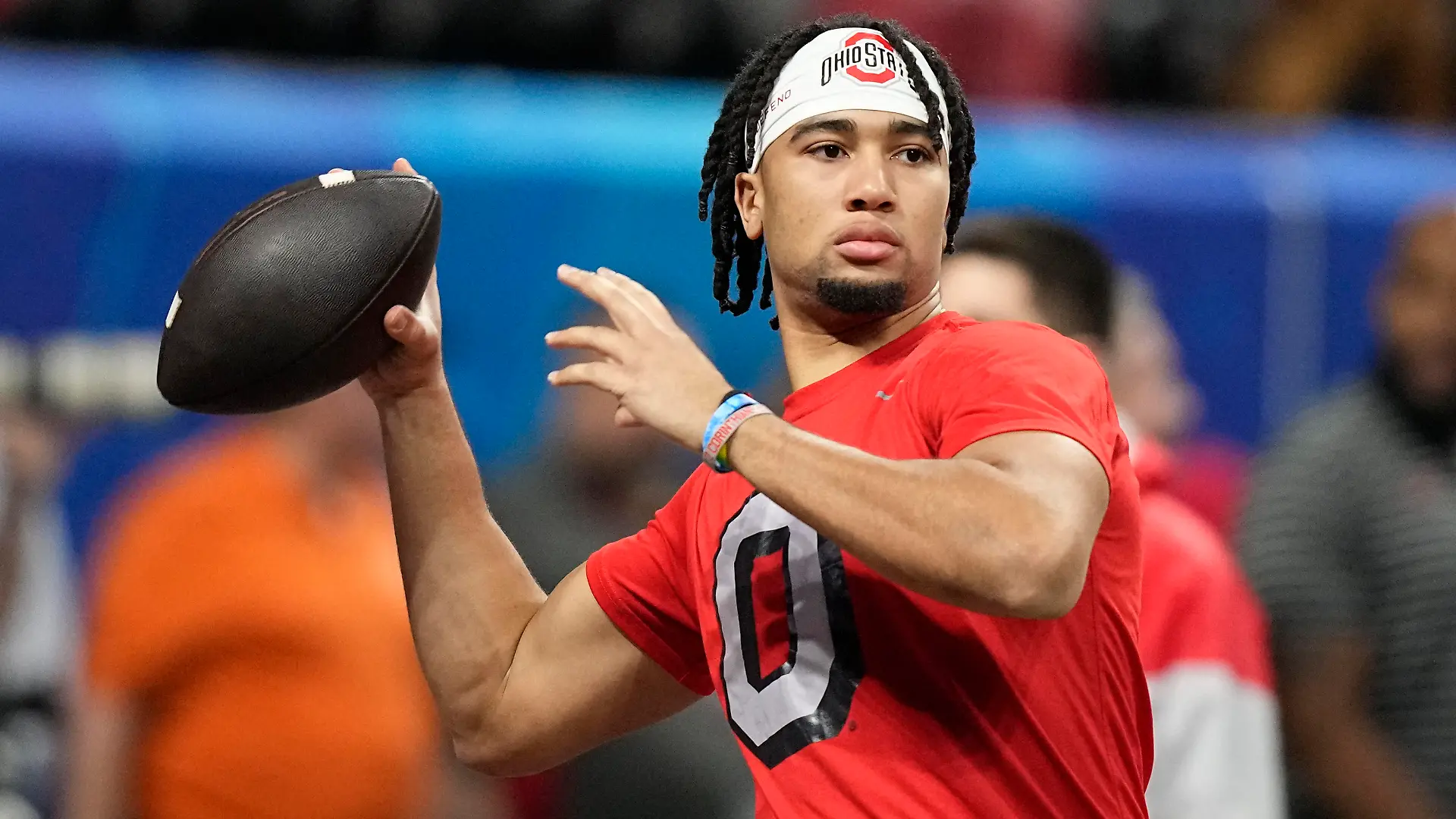 Ohio State quarterback C.J. Stroud warms up before the Peach Bowl NCAA college football semifinal playoff game between Georgia and Ohio State, Saturday, Dec. 31, 2022, in Atlanta. (AP Photo/Brynn Anderson)
