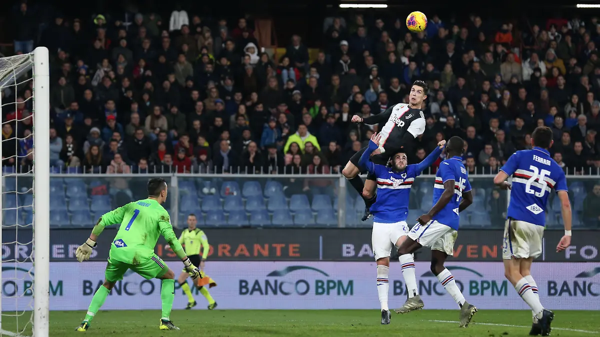  Cristiano Ronaldo of Juventus climbs above Nicola Murru of Sampdoria to head the ball past Emil Audero in the Sampdoria to give the side a 2-1 lead during the Serie A match at Luigi Ferraris, Genoa. Picture date: 18th December 2019. Picture credit should read: Jonathan Moscrop/Sportimage PUBLICATIONxNOTxINxUK SPI-0378-0019