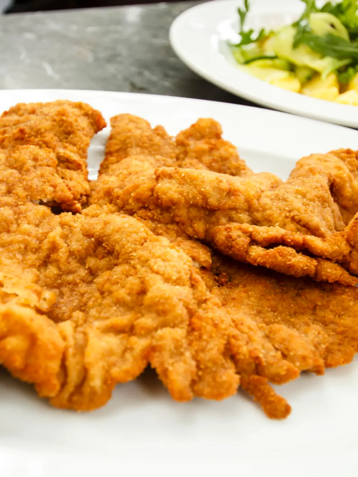 Traditional Wiener schnitzel, classic speciality of the Viennese cuisine, Vienna, Austria