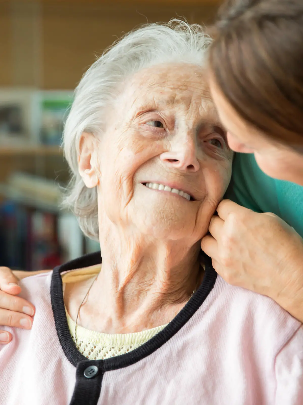 Senior woman with home caregiver