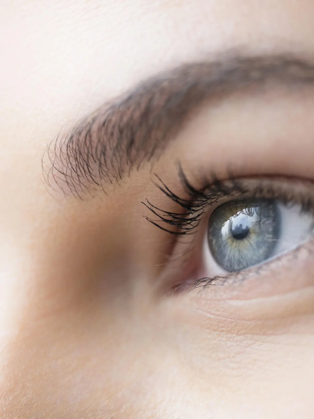 Close up of young woman with blue eyes, Close up der jungen Frau mit blauen Augen | Verwendung weltweit, Keine Weitergabe an Wiederverkäufer.