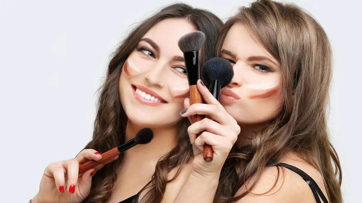 Woman with a brush for make-up