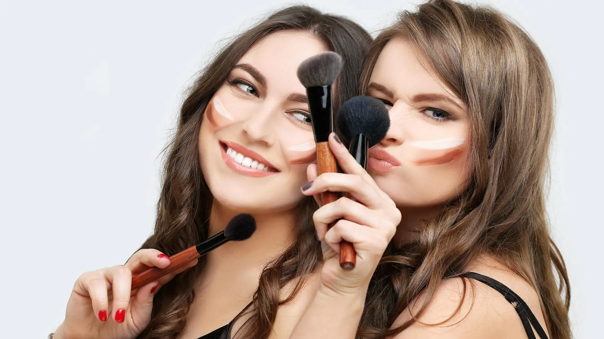 Woman with a brush for make-up