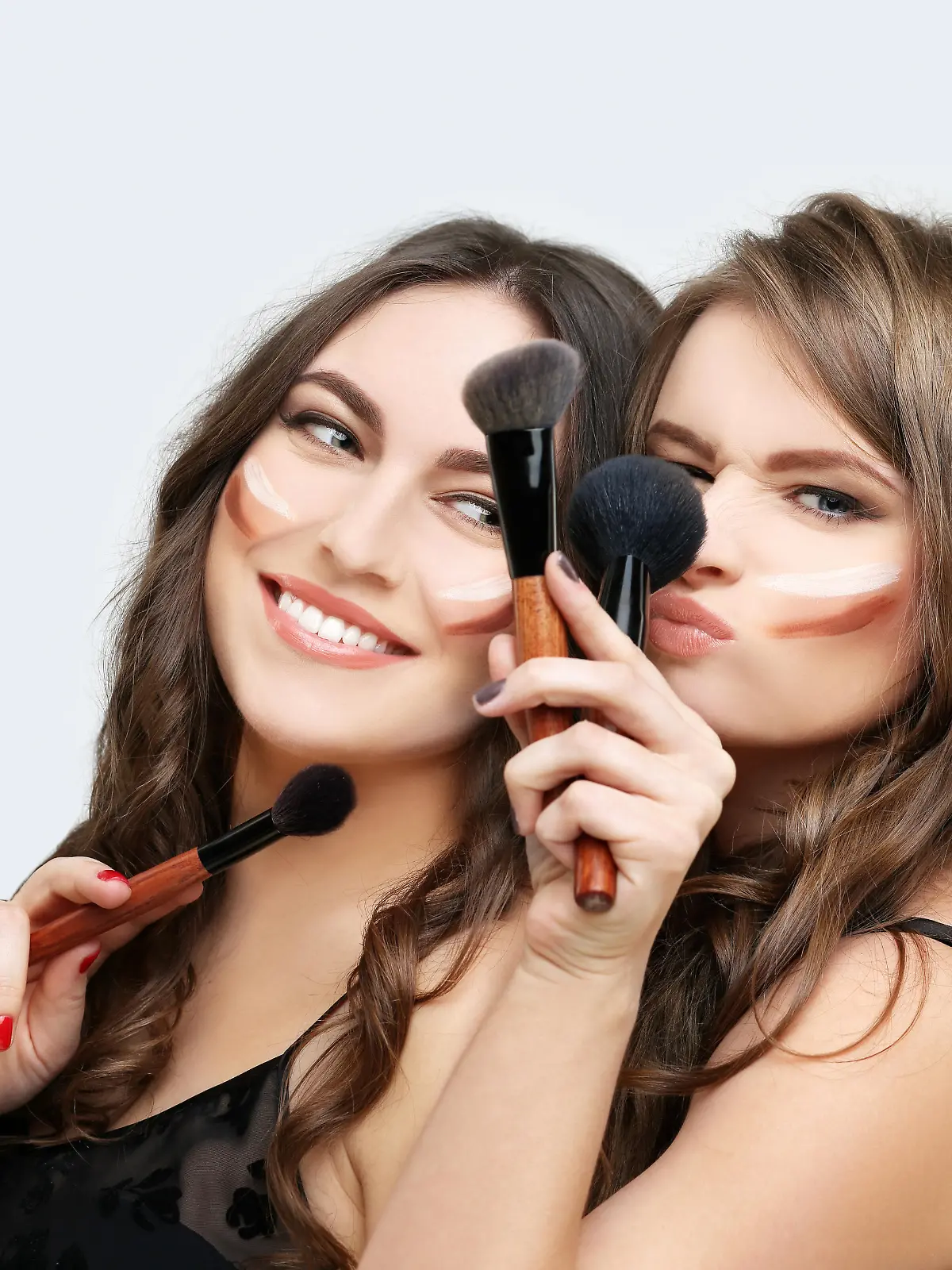 Woman with a brush for make-up