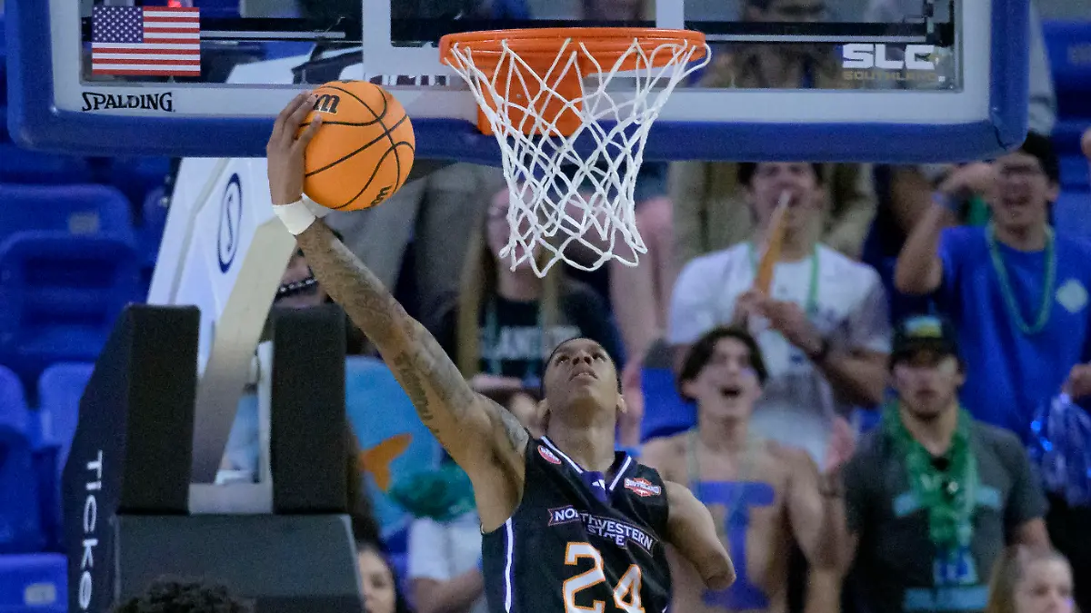 Northwestern State guard Hansel Enmanuel (24) goes up to dunk against Texas A