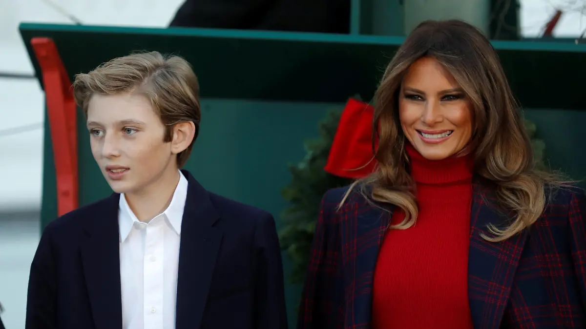 First lady Melania Trump and her son Barron Trump welcome the official White House Christmas Tree, a Wisconsin-grown tree provided by the Chapman family of Silent Night Evergreens, to the White House in Washington DC, U.S. November 20, 2017. REUTERS/Carlos Barria
