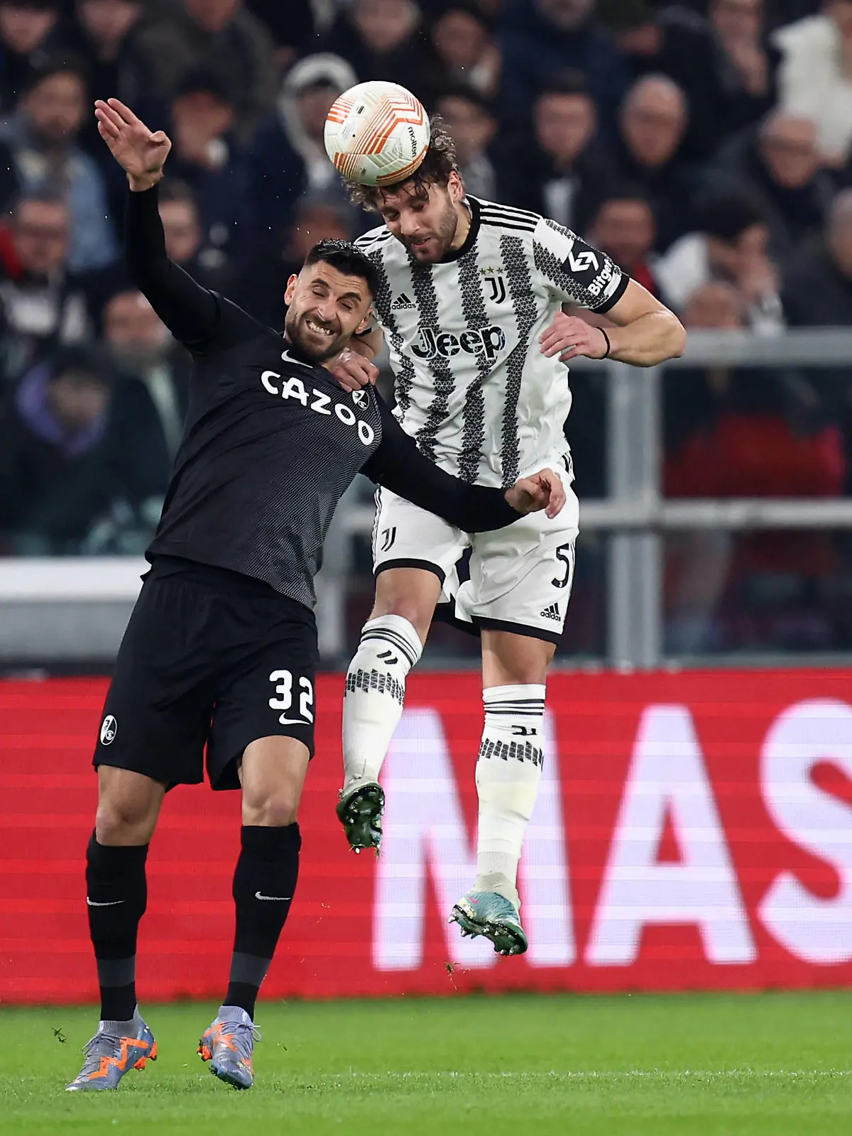 Juventus Fc - Sc Freiburg Vincenzo Grifo of Sc Freiburg and Manuel Locatelli of Juventus Fc battle for the ball during the Uefa Europa League round of 16 first leg match beetween Juventus Fc and Sc Freiburg at Allianz Stadium on March 9 2023 in Turin, Italy . Turin Allianz Stadium Italy Copyright: xMarcoxCanonierox