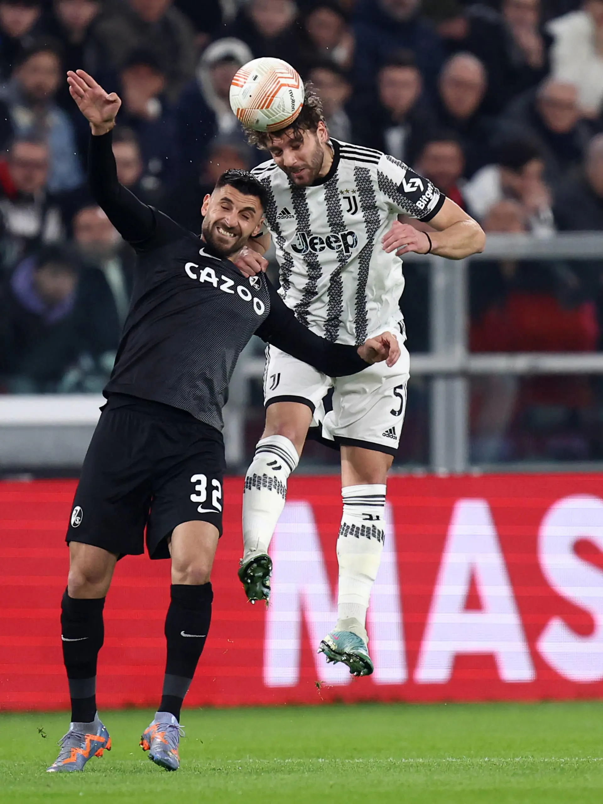 Juventus Fc - Sc Freiburg Vincenzo Grifo of Sc Freiburg and Manuel Locatelli of Juventus Fc battle for the ball during the Uefa Europa League round of 16 first leg match beetween Juventus Fc and Sc Freiburg at Allianz Stadium on March 9 2023 in Turin, Italy . Turin Allianz Stadium Italy Copyright: xMarcoxCanonierox