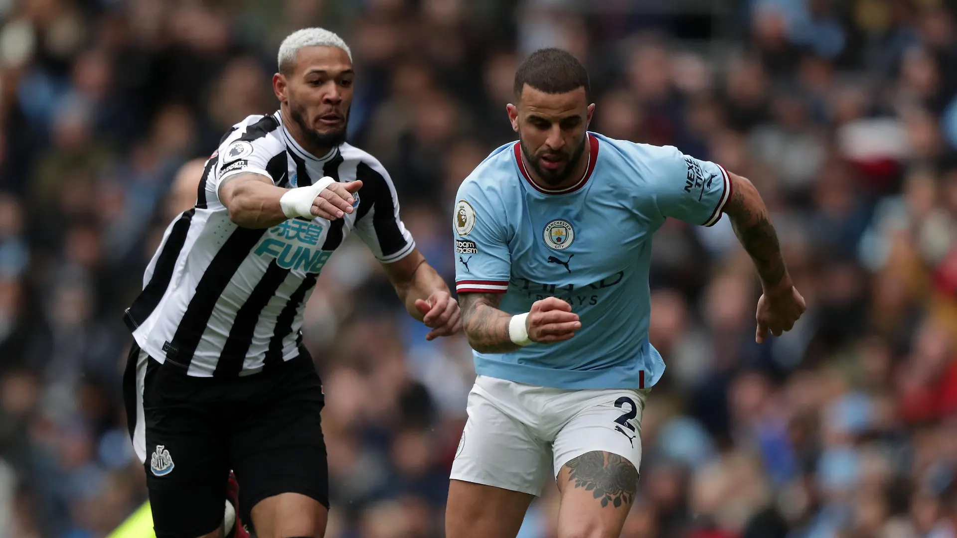 4th March 2023; Etihad Stadium, Manchester, England; Premier League Football, Manchester City versus Newcastle United; Kyle Walker of Manchester City takes on Bruno Guimaraes of Newcastle United / action press