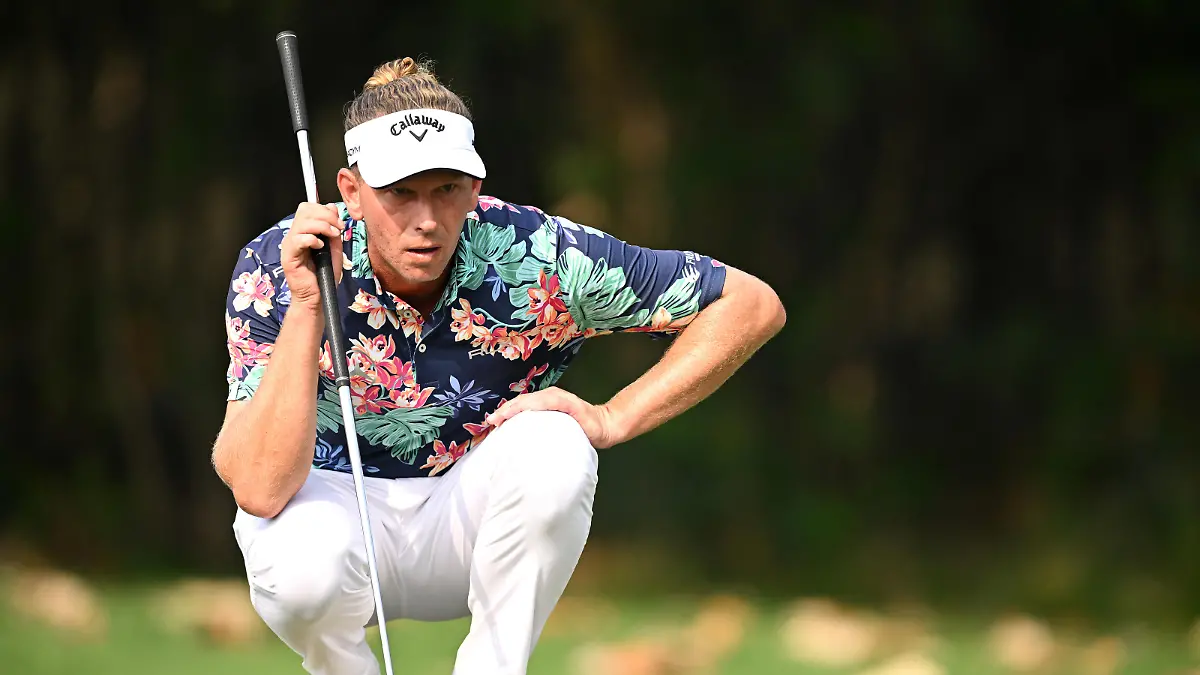NEW DELHI, INDIA - FEBRUARY 26: Marcel Siem of Germany lines up a putt on the 14th green during Day Four of the Hero Indian Open at Dlf Golf and Country Club on February 26, 2023 in India. (Photo by Stuart Franklin/Getty Images)