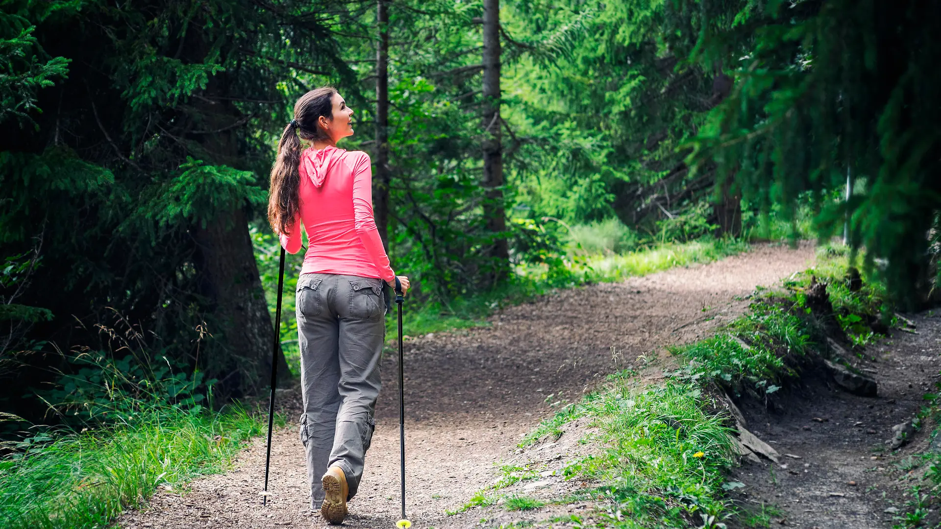 While the rest of the world is busy, a woman is enjoying the silence in the forest. Shot in Valais, Switzerland.