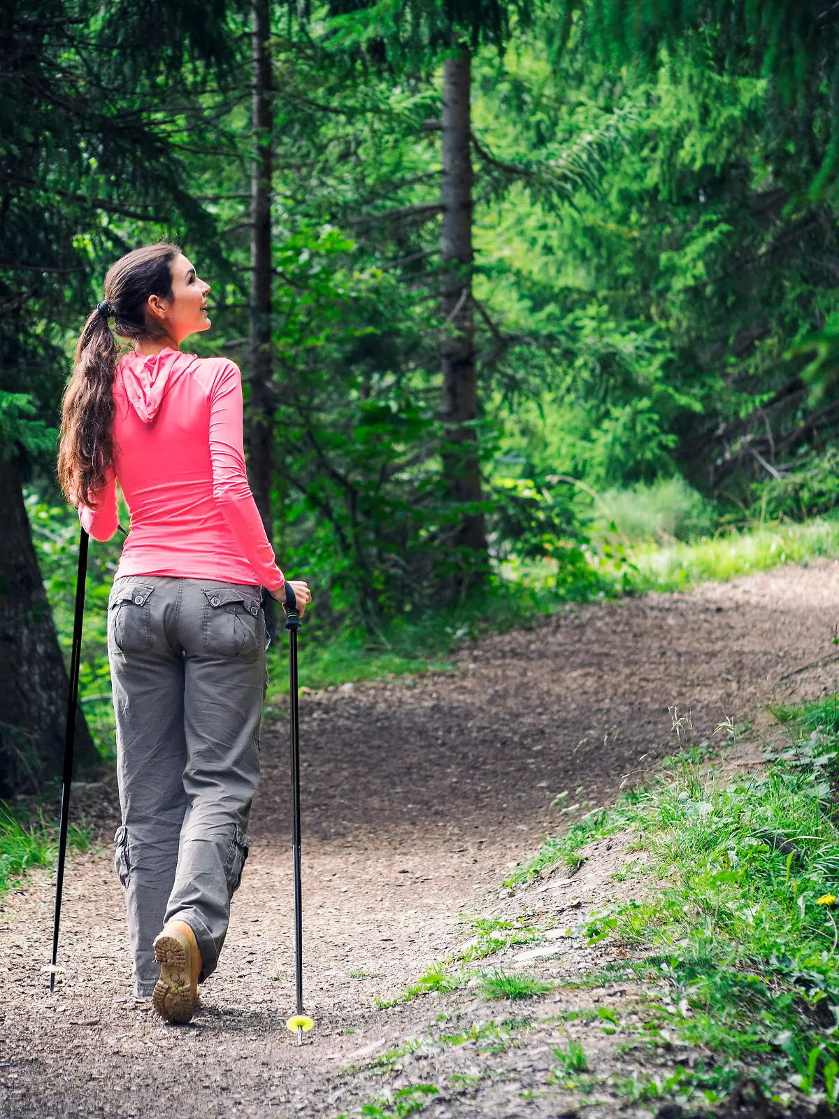 While the rest of the world is busy, a woman is enjoying the silence in the forest. Shot in Valais, Switzerland.