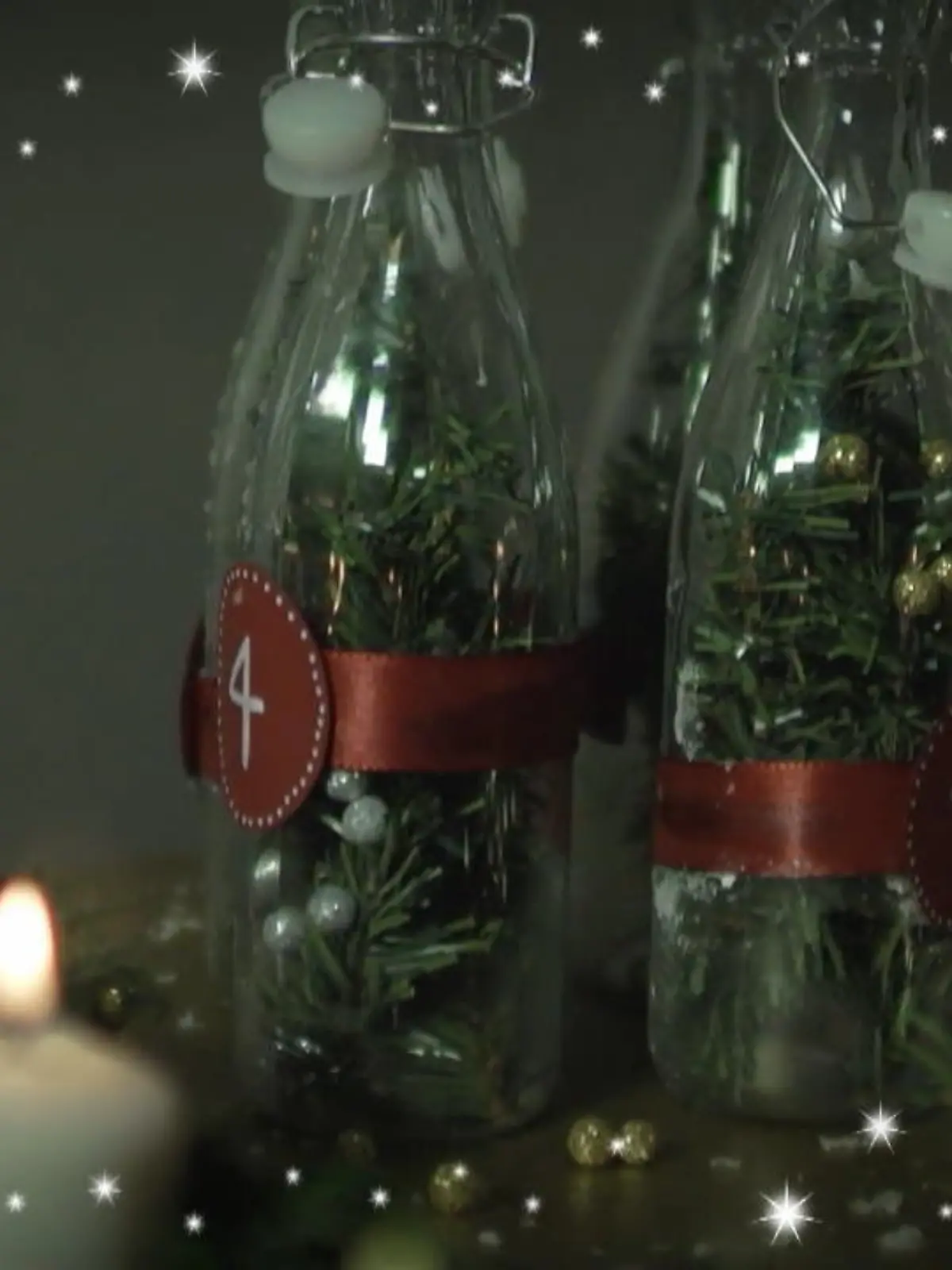 Bild zu: "Adventskranz aus Glasflaschen basteln"