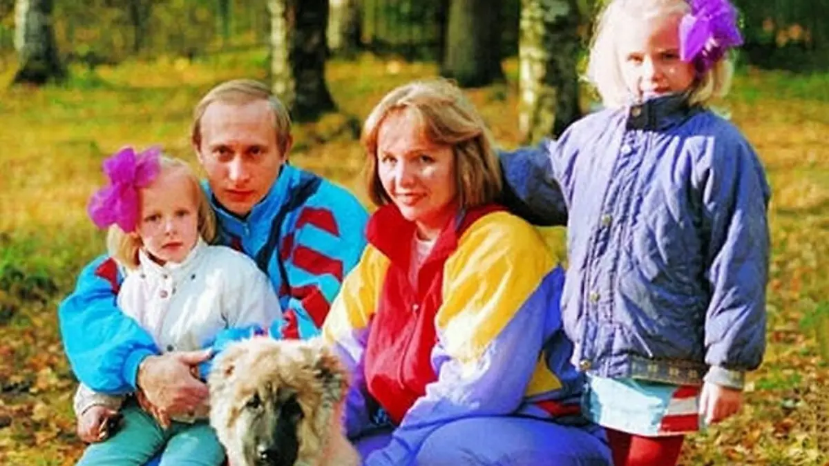 Before rising to power as one of the most infamous leaders in the world, Putin was a playful, hipster-dressing man in love. circa 1990 - Russia - Young Vladimir Putin with his wife Lyudmila and daughters. St. Petersburg Russia - ZUMAz03_ 79668006st Copyright: xRussianxArchivesx