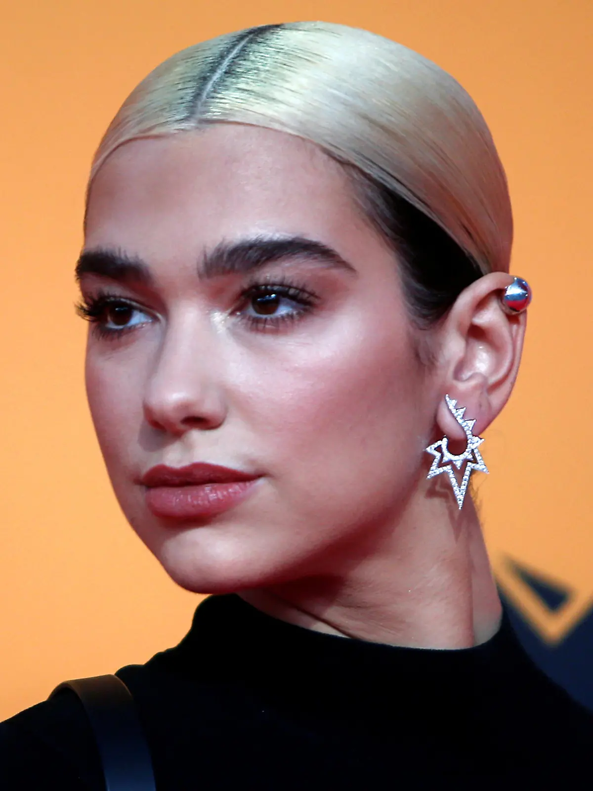 Dua Lipa poses on a red carpet as she arrives at the 2019 MTV Europe Music Awards at the FIBES Conference and Exhibition Centre in Seville, Spain, November 3, 2019. REUTERS/Jon Nazca