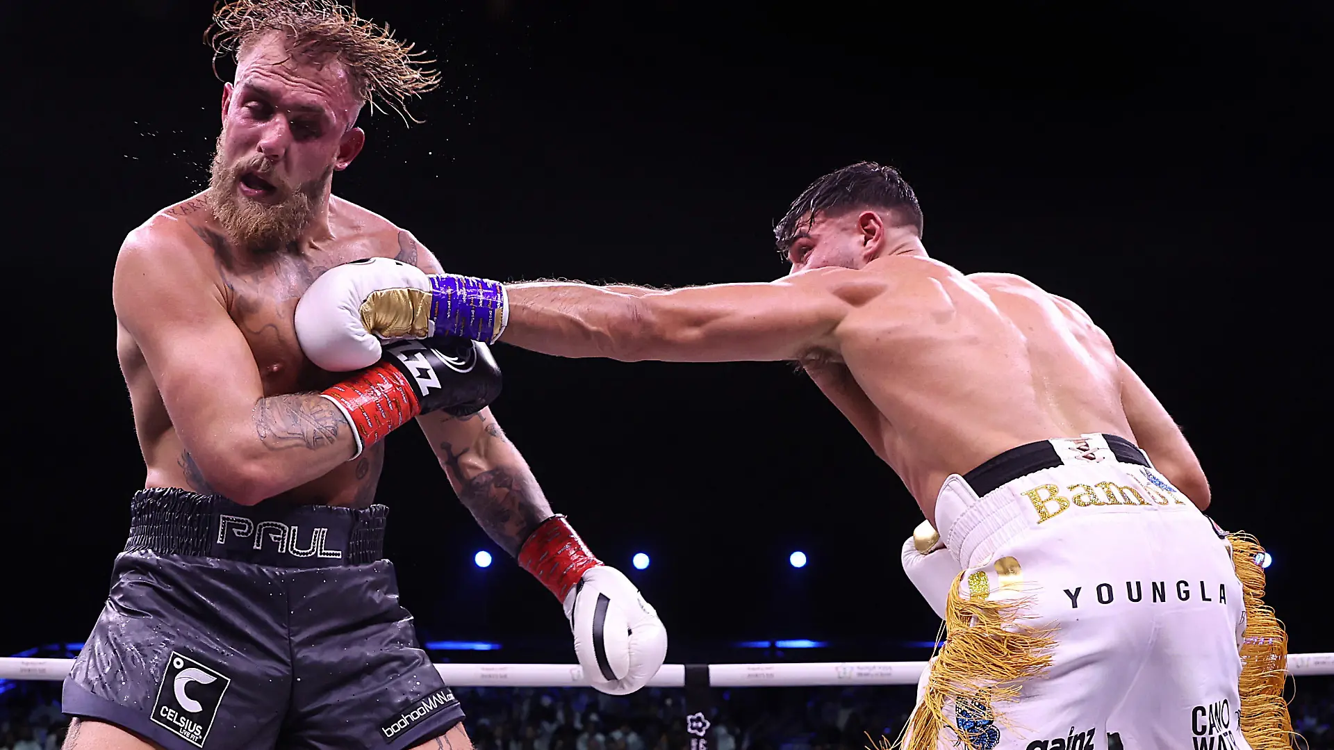 RIYADH, SAUDI ARABIA - FEBRUARY 26: Tommy Fury punches Jake Paul during the Cruiserweight Title fight between Jake Paul and Tommy Fury at the Diriyah Arena on February 26, 2023 in RIYADH, Saudi Arabia. (Photo by Francois Nel/Getty Images)