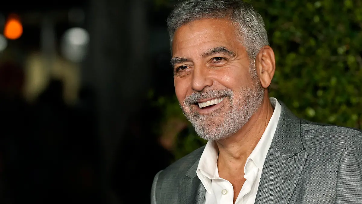 FILE - George Clooney, a cast member in "Ticket to Paradise," poses at the premiere of the film, Monday, Oct. 17, 2022, at the Regency Village Theatre in Los Angeles. Clooney turns 62 on May 6. (AP Photo/Chris Pizzello, File)