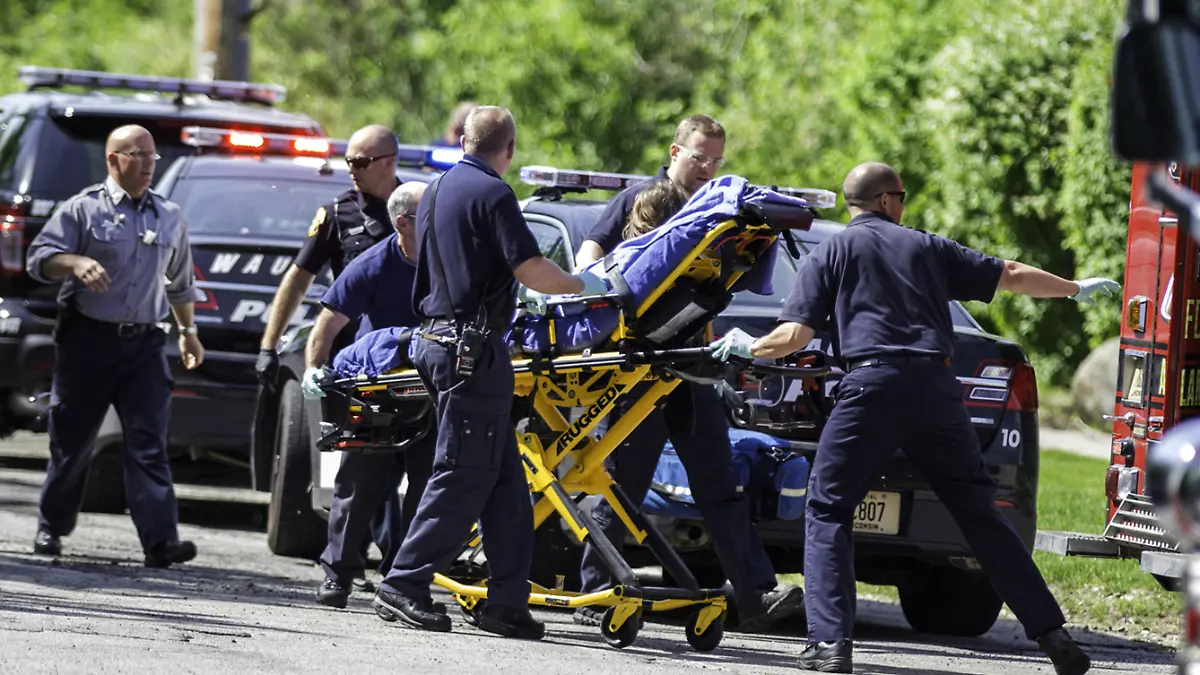 FILE - In this May 31, 2014 file photo, rescue workers take 12-year-old stabbing victim Payton Leutner to an ambulance in Waukesha, Wis. A Wisconsin state appeals court ruled July 27, 2016, that the two girls accused of trying to kill Leutner in an attempt to please the fictional horror character Slender Man should be tried as adults. The 2nd District Appeals court, in a pair of rulings, affirmed a lower court's determination that it was reasonable to try both girls as adults. The girls could appeal the rulings to the Wisconsin Supreme Court. (AP Photo/Abe Van Dyke, File) |