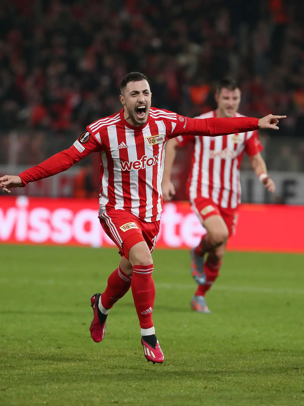 Josip Juranovic jubelnd nach 2:0, li. Steven Berghuis / Freude / Emotion / Jubel / Sport / Fußball Fussball / UEL UEFA Europa League Herren / Saison 2022/2023 / 23.02.2023 / 1.FC Union Berlin FCU vs. Ajax Amsterdam / DFL regulations prohibit any use of photographs as image sequences and/or quasi-video. /
