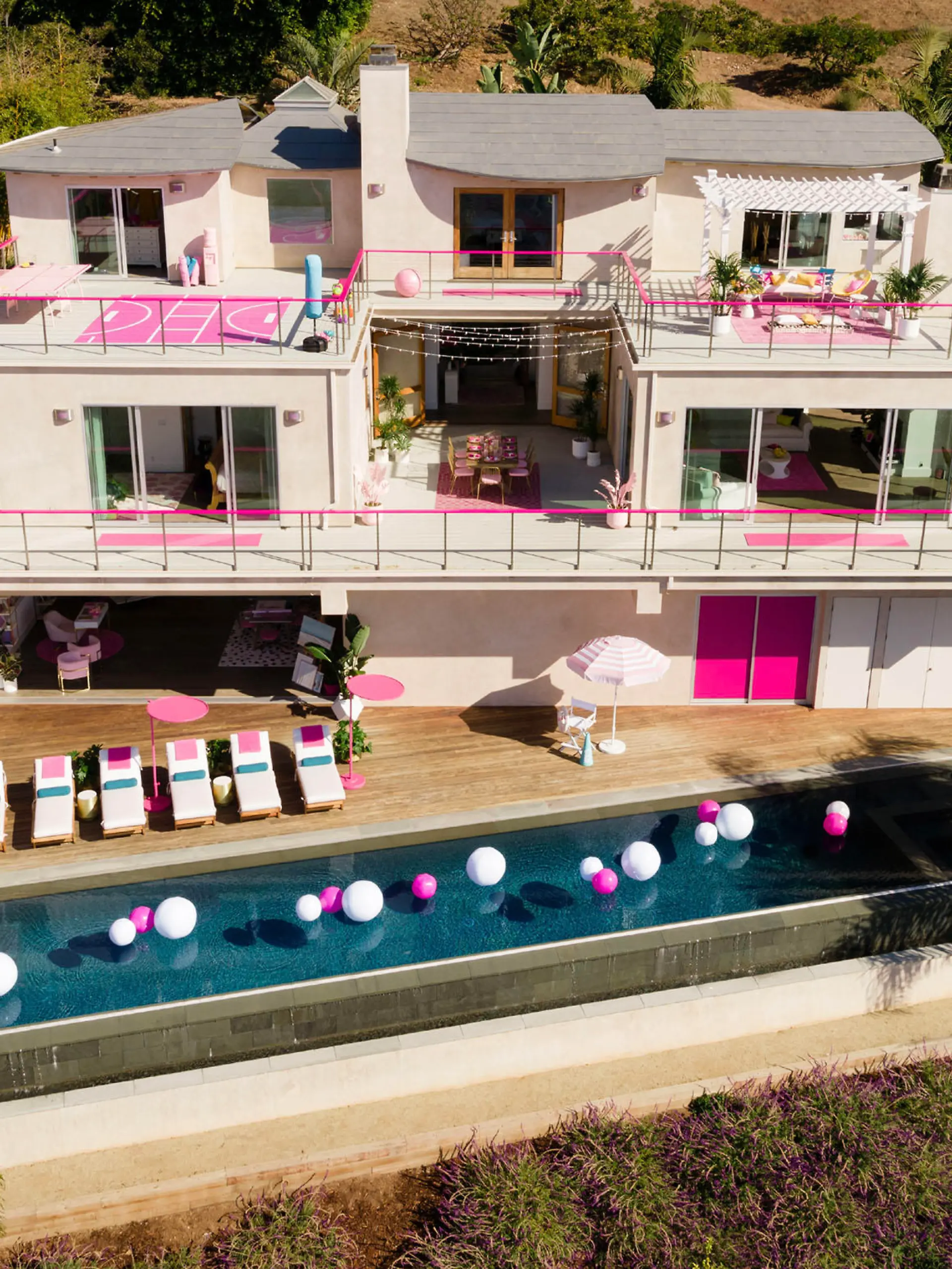 Prepare for the chance to live in a Barbie World! Airbnb lists real life version of iconic doll's 'Malibu Dreamhouse' for the ultimate fan stay. Located in the heart of Malibu and overlooking the Pacific Ocean, the fabulous life-size Dreamhouse will be available to book from October 23 by one guest and up to three friends for a two-night stay. The palatial pink pad sleeps four, with two bedrooms and two baths. The one-time stay will take place Sunday, October 27 to Tuesday, October 29. This once in a lifetime opportunity is available for $60 USD a night (a nod to Barbie’s 60th anniversary), plus taxes and fees, at www.airbnb.com/barbie. The Barbie Dreamhouse Airbnb experience includes a meet-and-greet with celebrity hairstylist Jen Atkin, along with hair makeovers from hairstylists from Mane Addicts Creator Collective.
A one-on-one fencing lesson with inspirational role model and fencing medalist Ibtihaj Muhammad also comes as part of the deal, and an interactive, globally-inspired cooking lesson with one of Malibu’s favorite female business owners, Gina Clarke-Helm of Malibu Seaside Chef. A behind-the-scenes tour of Columbia Memorial Space Center with pilot and aerospace engineer Jill Meyers is also part of the bargain.

Pictured: Malibu barbie house
Ref: SPL5122840 171019 NON-EXCLUSIVE
Picture by: Airbnb/Splash / SplashNews.com

Splash News and Pictures
Los Angeles: 310-821-2666
New York: 212-619-2666
London: +44 (0)20 7644 7656
Berlin: +49 175 3764 166
photodesk@splashnews.com

World Rights, 
