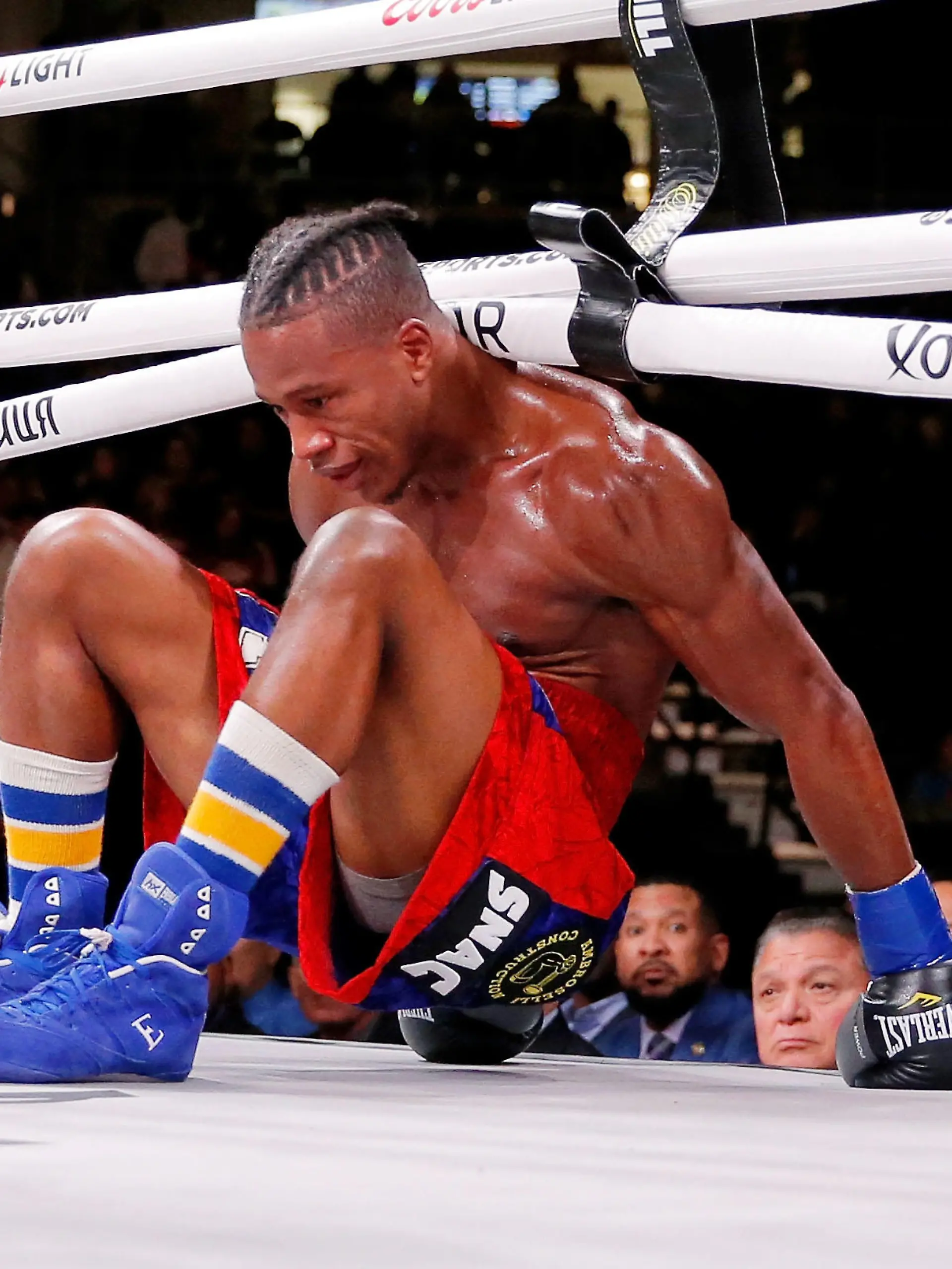 Oct 12, 2019; Chicago, IL, USA; Patrick Day (red trunks) reacts after getting knocked down by Charles Conwell (not pictured) during a USBA Super-Welterweight boxing match at Wintrust Arena. Mandatory Credit: Jon Durr-USA TODAY Sports