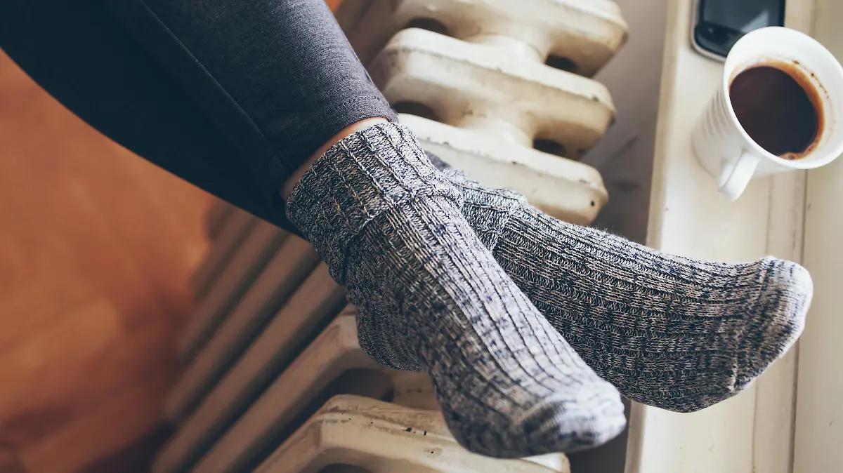 woman legs on radiator