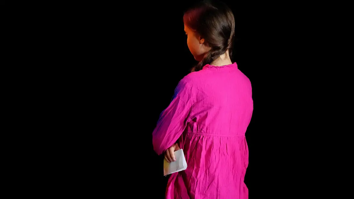 Swedish environmental activist Greta Thunberg walks out of the Climate Action Summit at United Nations HQ in the Manhattan borough of New York, New York, U.S., September 23, 2019. REUTERS/Carlo Allegri