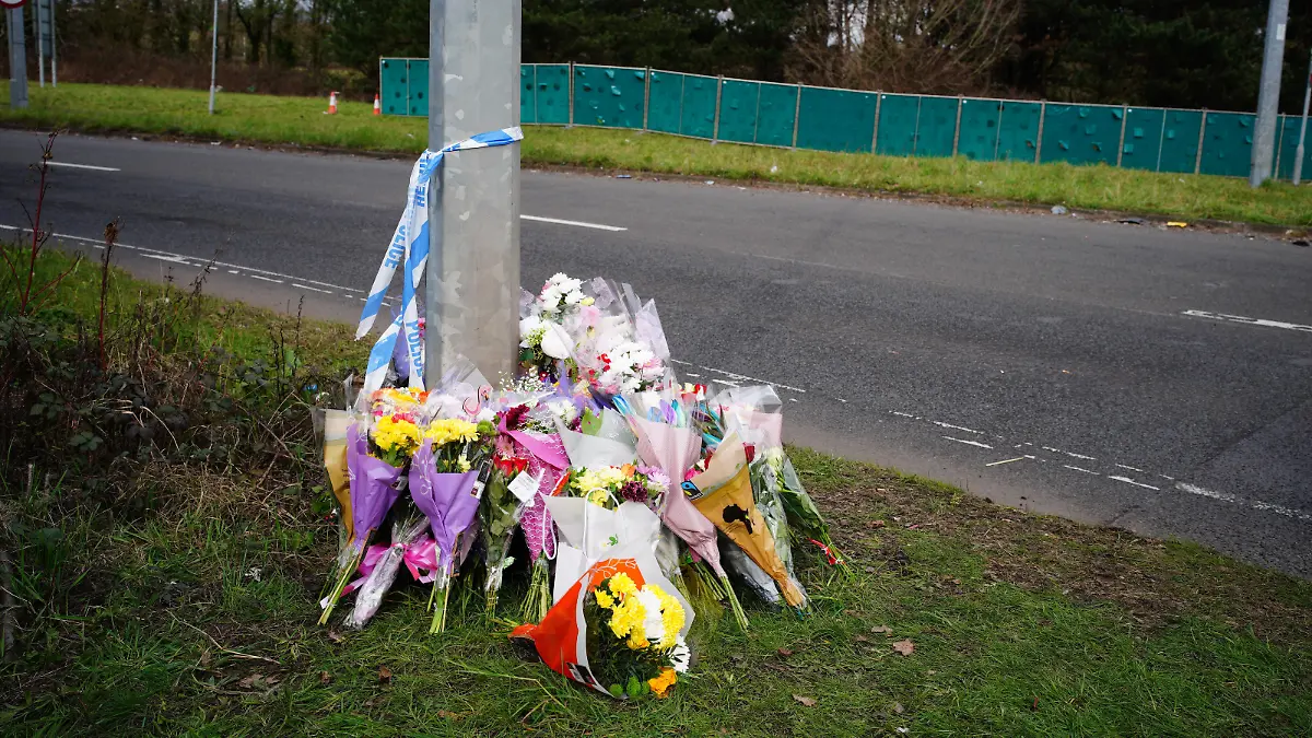 St Mellons deaths. Floral tributes left near the scene in the St Mellons area of Cardiff where three people who disappeared on a night out have died in a road traffic accident. Two others who had also been reported missing have been transported to hospital with serious injuries. Sophie Russon, 20, Eve Smith, 21, and Darcy Ross, 21, who had made the trip from Porthcawl, and Rafel Jeanne, 24, and Shane Loughlin, 32, both from Cardiff, had last been seen in the city in the early hours of Saturday. Picture date: Monday March 6, 2023. See PA story POLICE Cardiff. Photo credit should read: Ben Birchall/PA Wire URN:71262949