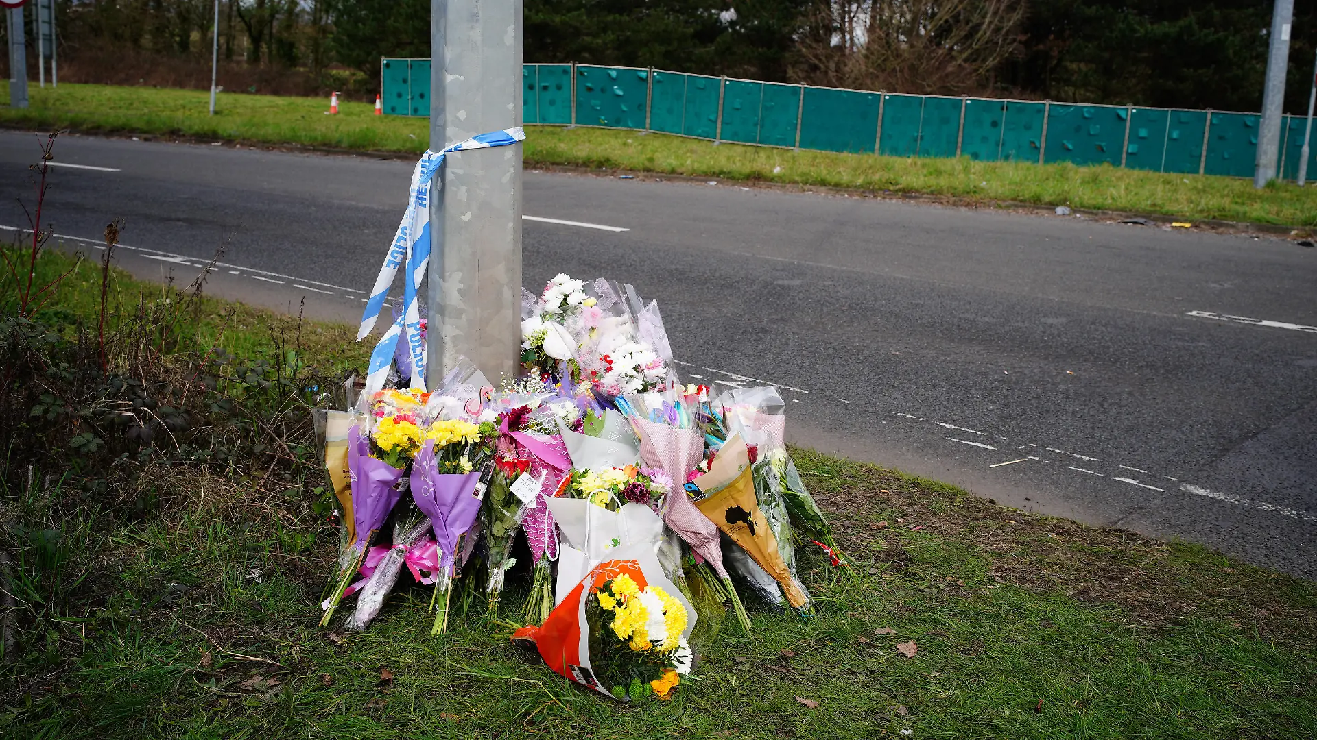 St Mellons deaths. Floral tributes left near the scene in the St Mellons area of Cardiff where three people who disappeared on a night out have died in a road traffic accident. Two others who had also been reported missing have been transported to hospital with serious injuries. Sophie Russon, 20, Eve Smith, 21, and Darcy Ross, 21, who had made the trip from Porthcawl, and Rafel Jeanne, 24, and Shane Loughlin, 32, both from Cardiff, had last been seen in the city in the early hours of Saturday. Picture date: Monday March 6, 2023. See PA story POLICE Cardiff. Photo credit should read: Ben Birchall/PA Wire URN:71262949