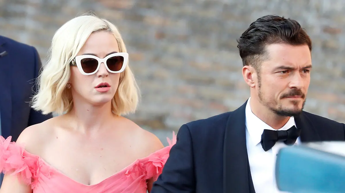 Singer Katy Perry and actor Orlando Bloom arrive to attend the wedding of fashion designer Misha Nonoo at Villa Aurelia in Rome, Italy, September 20, 2019. REUTERS/Yara Nardi