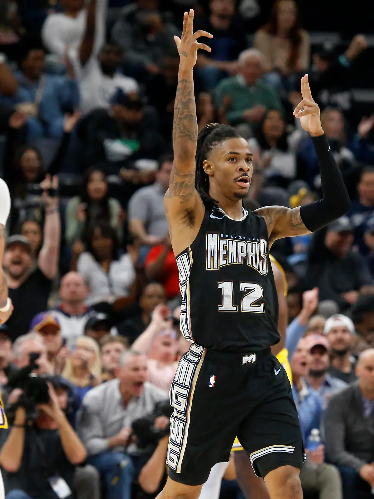 NBA, Basketball Herren, USA Los Angeles Lakers at Memphis Grizzlies Feb 28, 2023 Memphis, Tennessee, USA Memphis Grizzlies guard Ja Morant 12 reacts during the second half against the Los Angeles Lakers at FedExForum. Memphis FedExForum Tennessee USA, EDITORIAL USE ONLY PUBLICATIONxINxGERxSUIxAUTxONLY Copyright: xPetrexThomasx 20230228_jhp_in1_0252