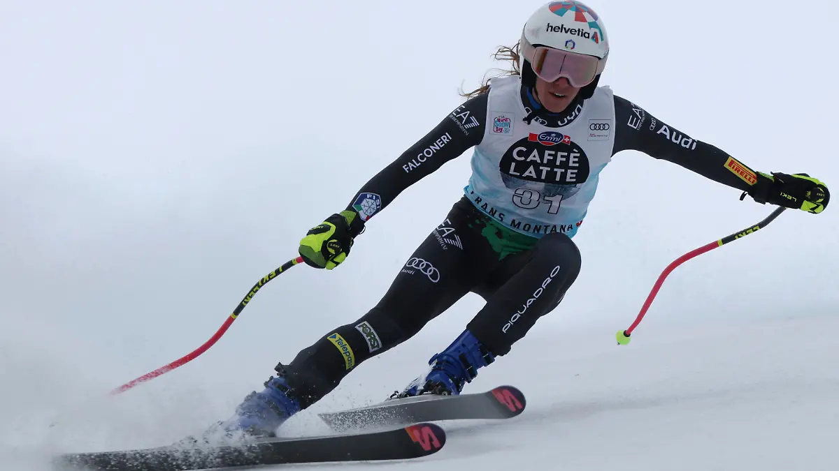 Italy's Marta Bassino speeds down the course during an alpine ski, women's World Cup downhill race in Crans Montana, Switzerland, Sunday, Feb. 26, 2023. (AP Photo/Alessandro Trovati)