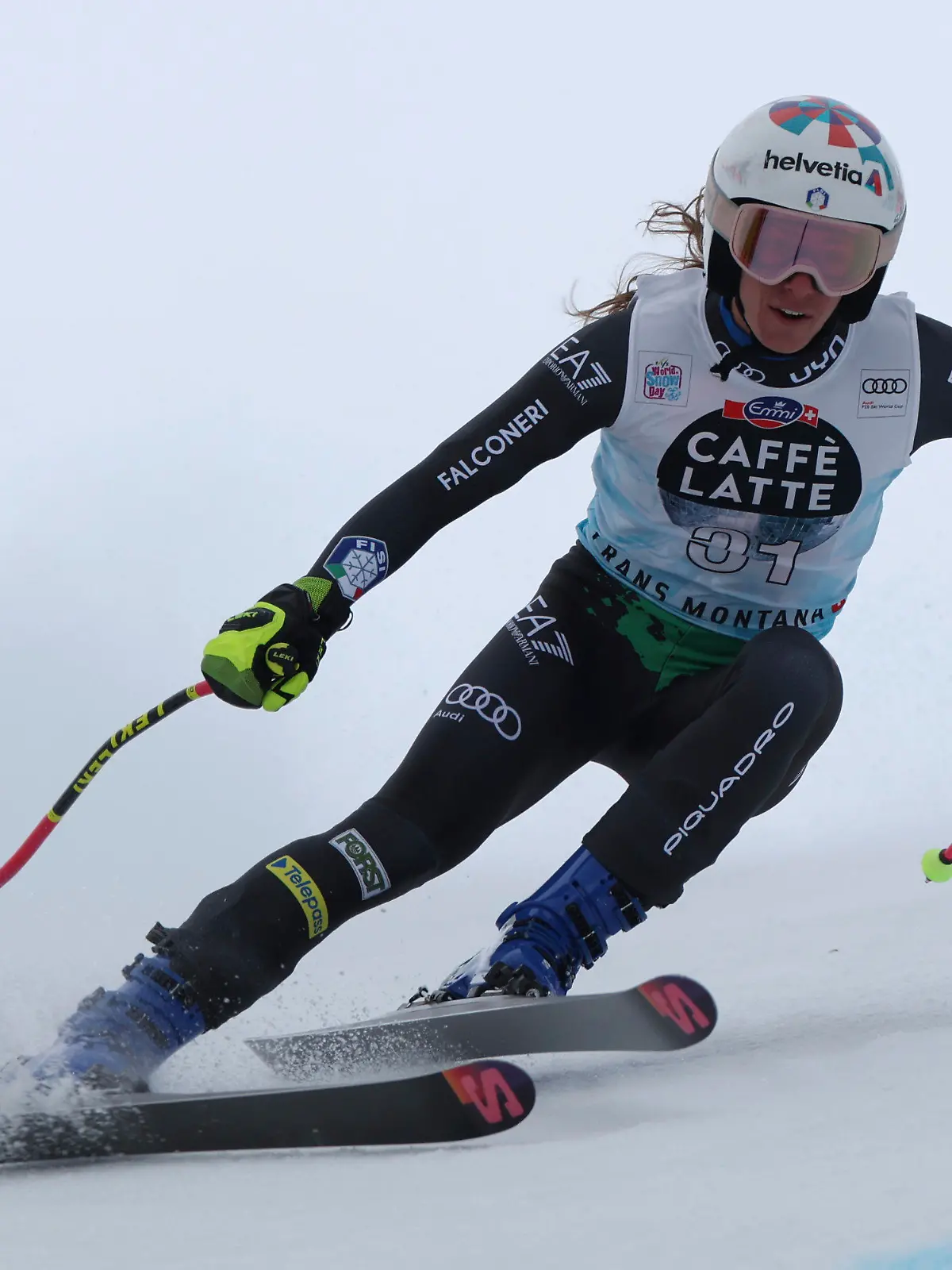 Italy's Marta Bassino speeds down the course during an alpine ski, women's World Cup downhill race in Crans Montana, Switzerland, Sunday, Feb. 26, 2023. (AP Photo/Alessandro Trovati)