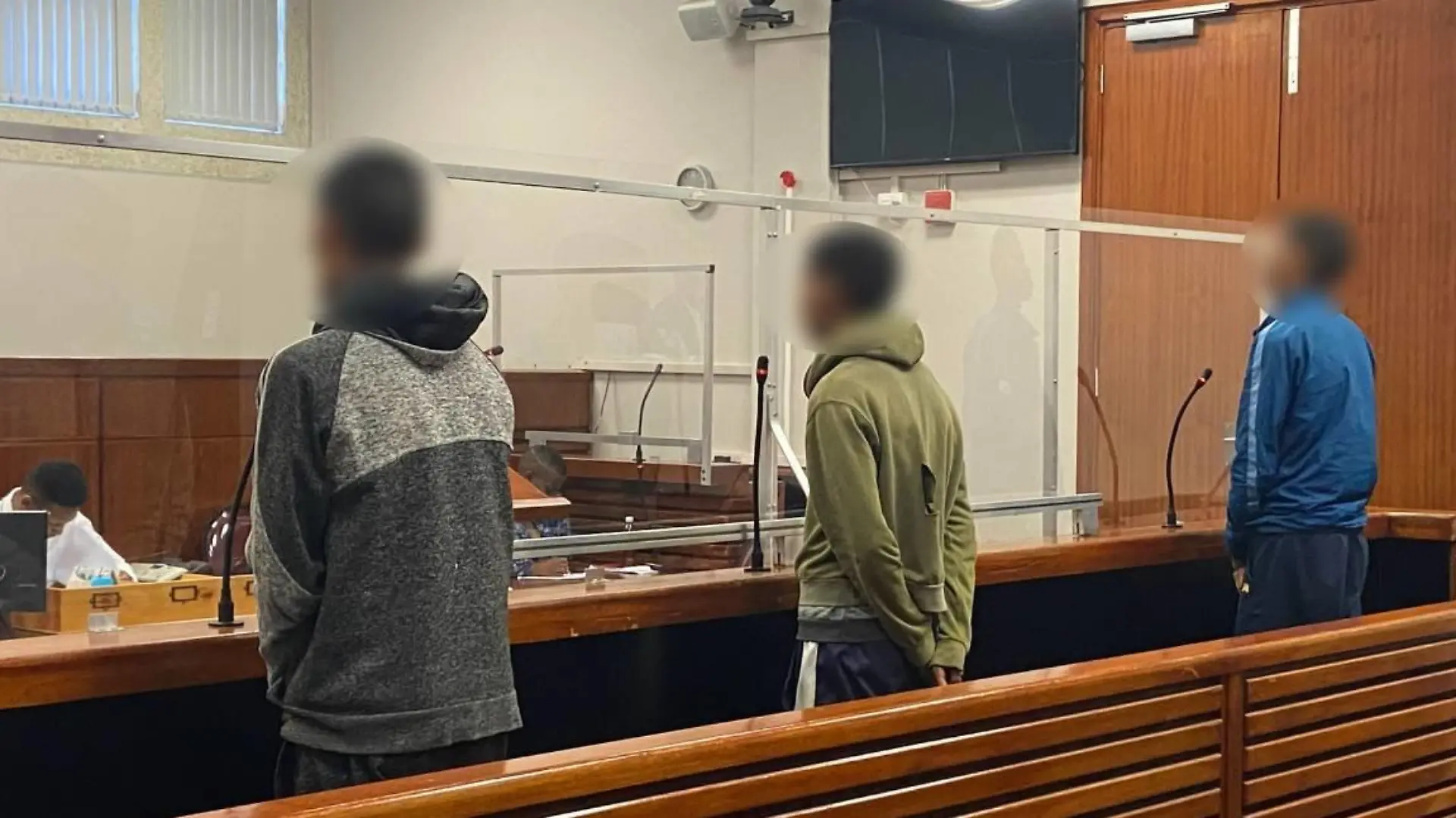 Die drei Angeklagten in Kapstadt vor Gericht
