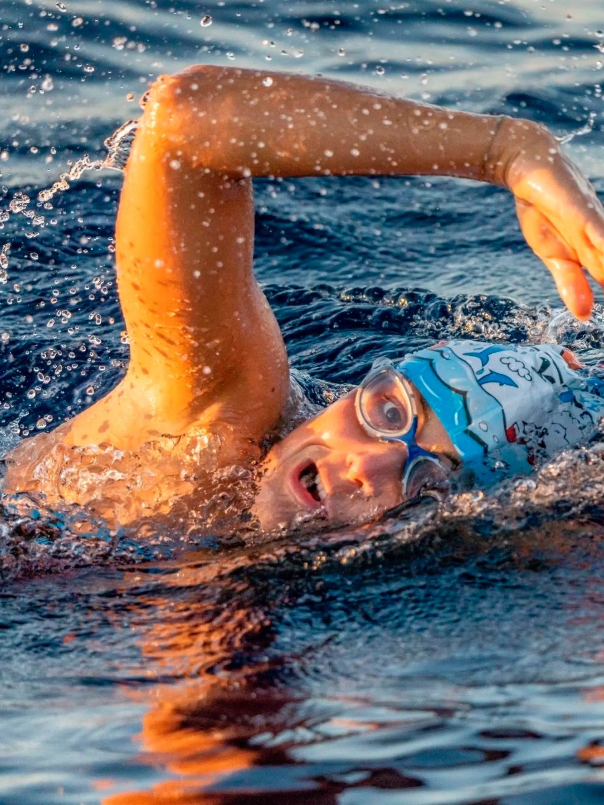 In this image released on Thursday, June 10th 2021, Nathalie Pohl swims the Menorca Channel. Pohl's time of 9h50s was an hour faster than the previous record holder and only 26 minutes slower than the fastest man. HANDOUT IMAGE - please refer to special instructions. (Marc Le Cornu/NP-Invest GmbH/news aktuell via AP Images)