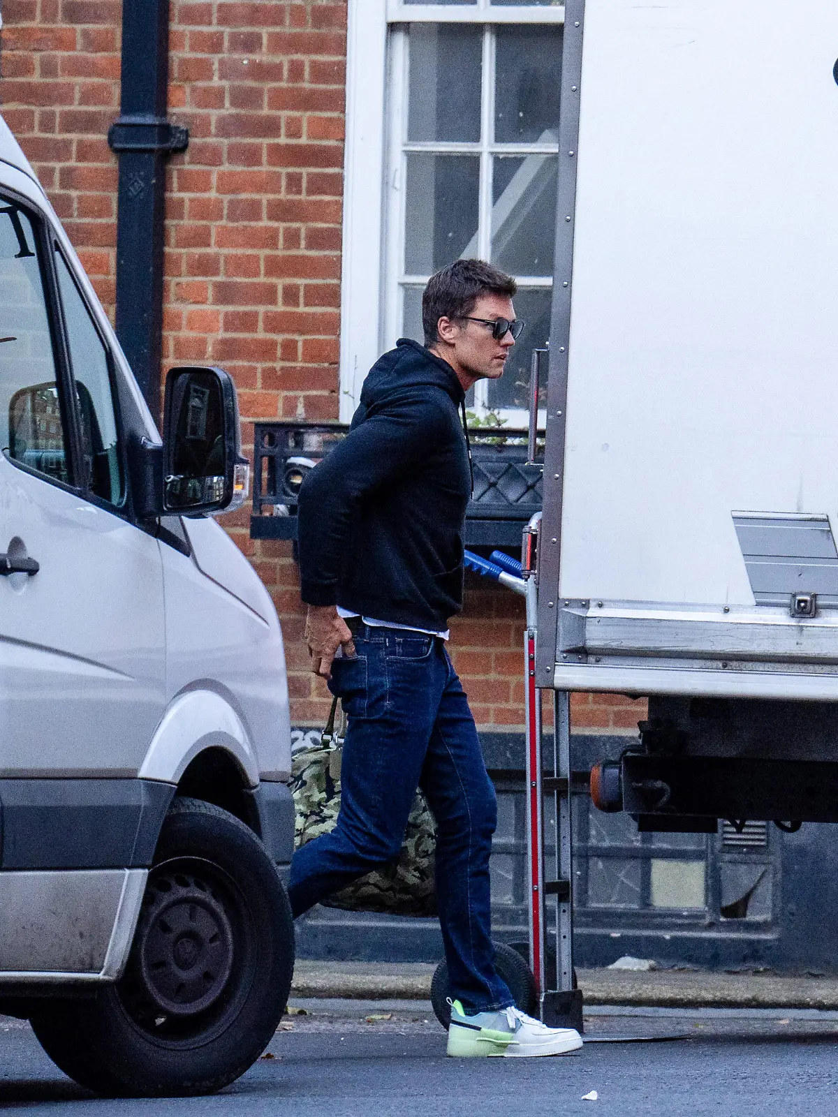 EXCLUSIVE: Tom Brady Leaves A London Hotel And Flies Out Of The UK Following A 48-Hour Rendezvous With Model Lover Irina Shayk.

The NFL superstar, who was in the UK to attend Birmingham City's first home game, was spotted checking out of The Twenty Two Hotel at 7.20am on Tuesday morning (August 15).

He left via a low key side entrance and his vehicle was loaded with luggage.

Tom was later seen arriving at a private airport to fly out of the UK.

Pictured: Tom Brady
Ref: SPL9674188 150823 EXCLUSIVE
Picture by: SplashNews.com

Splash News and Pictures
USA: 310-525-5808 
UK: 020 8126 1009
eamteam@shutterstock.com

World Rights, No France Rights
