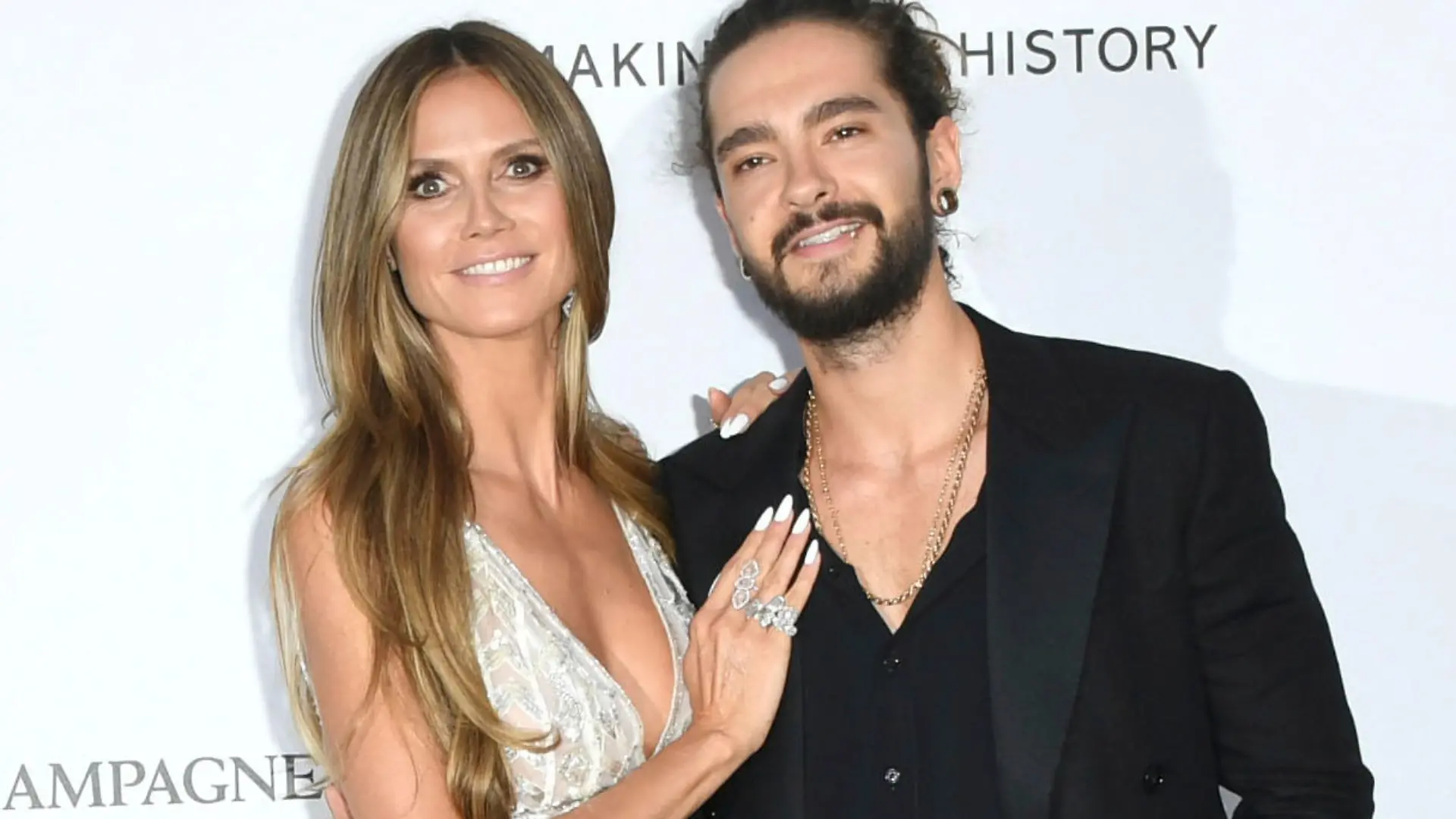 ARCHIV - 17.05.2018, Frankreich, Cannes: Heidi Klum, Moderatorin von «Germany's Next Topmodel», und ihr Partner Tom Kaulitz, Gitarrist der Band Tokio Hotel, kommen zur amfAR-Benefiz-Veranstaltung «Cinema Against AIDS» im Rahmen des 71. Filmfestivals. (zu dpa-Korr "Heidi, komm heim: Entgeht Bergisch Gladbach die Hochzeit des Jahres?") Foto: Arthur Mola/Invision/AP/dpa +++ dpa-Bildfunk +++