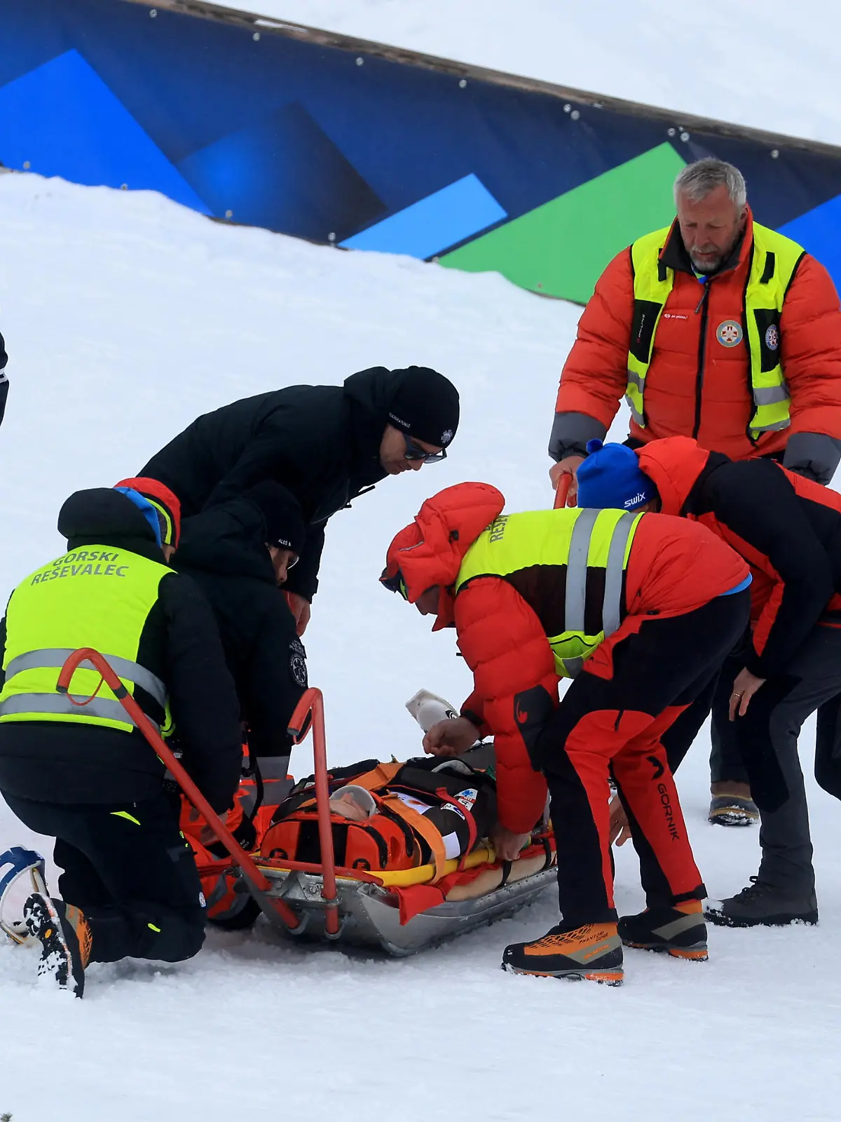 Nordic Skiing - FIS Nordic World Ski Championships - Planica, Slovenia - March 1, 2023 Slovenia's Peter Prevc is taken on a stretchered after sustaining an injury during training REUTERS/Borut Zivulovic