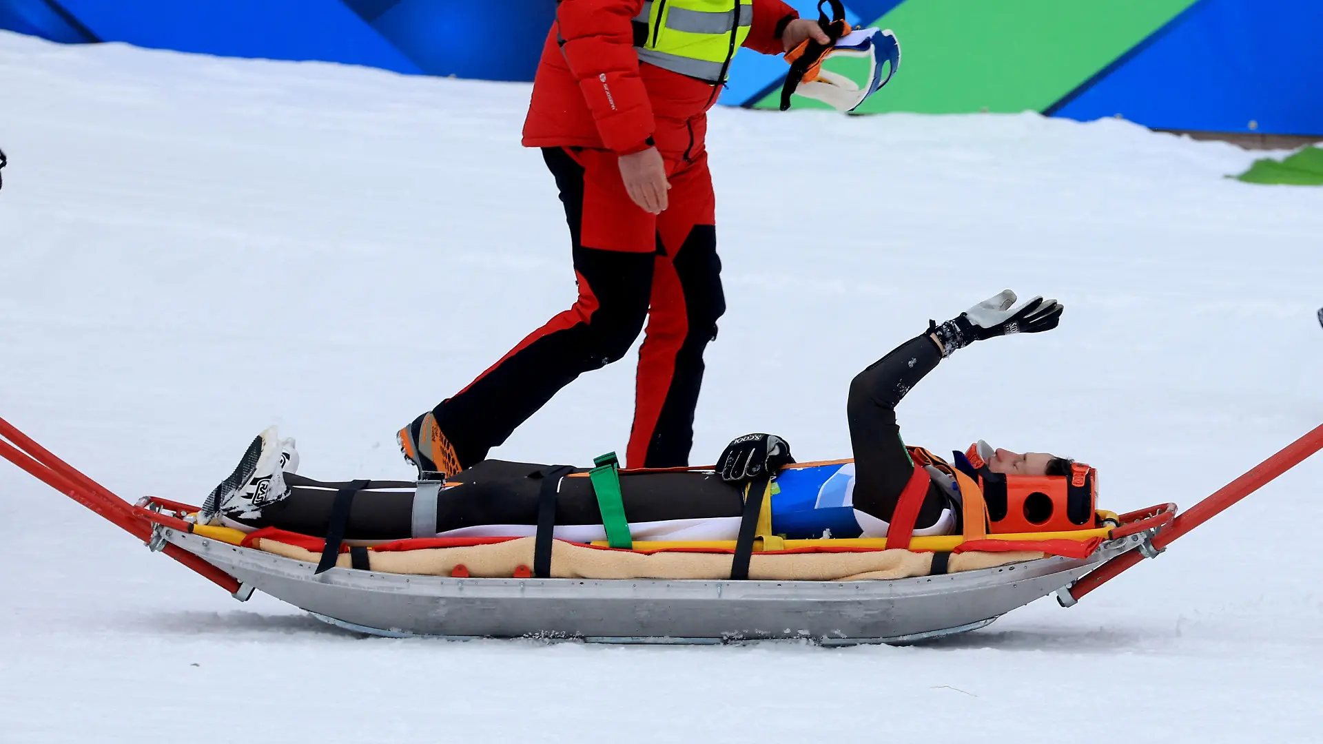 Nordic Skiing - FIS Nordic World Ski Championships - Planica, Slovenia - March 1, 2023 Slovenia's Peter Prevc is taken on a stretchered after sustaining an injury during training REUTERS/Borut Zivulovic
