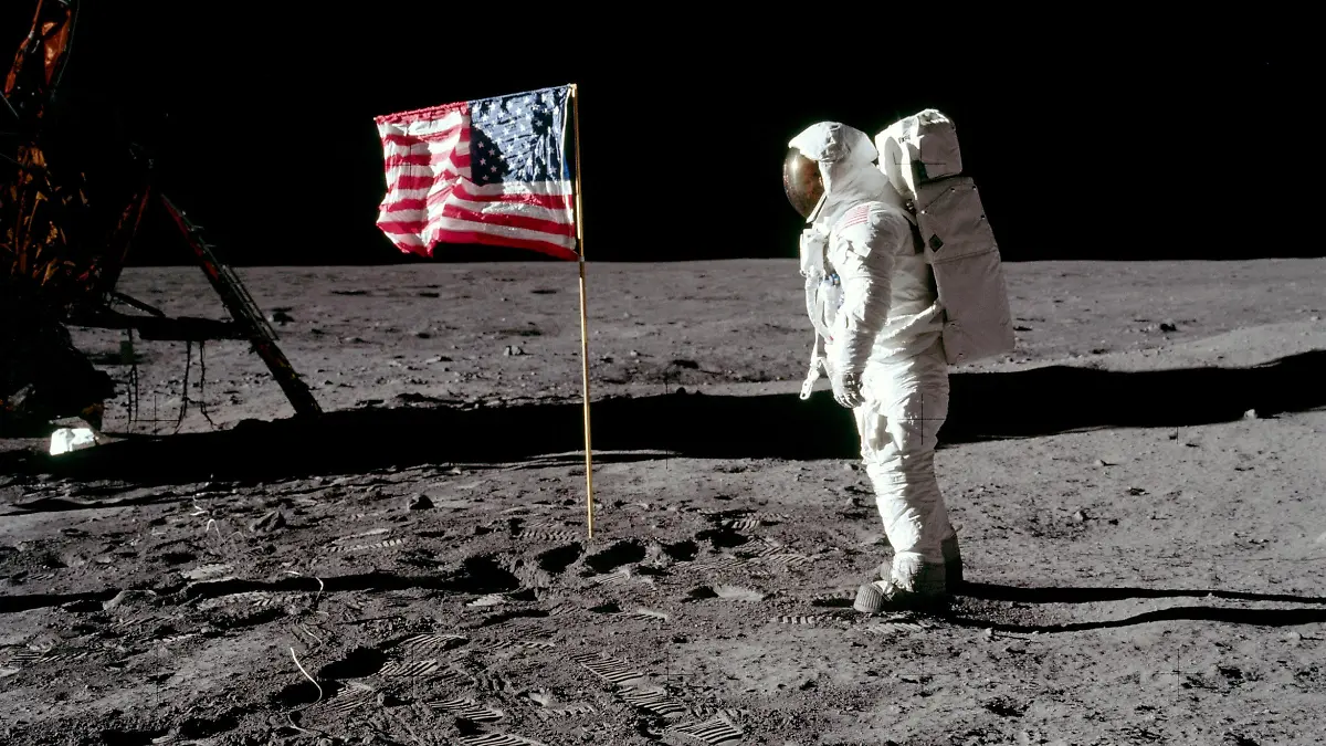FILE PHOTO: Astronaut Buzz Aldrin, lunar module pilot for Apollo 11, poses for a photograph besides the deployed United States flag during an extravehicular activity (EVA) on the moon, July 20, 1969. The lunar module (LM) is on the left, and the footprints of the astronauts are visible in the soil. Neil Armstrong/NASA/Handout via REUTERS/File Photo ATTENTION EDITORS - THIS IMAGE HAS BEEN SUPPLIED BY A THIRD PARTY TPX IMAGES OF THE DAY PLEASE SEARCH "50TH ANNIVERSARY OF THE MOON LANDING" FOR ALL PICTURES