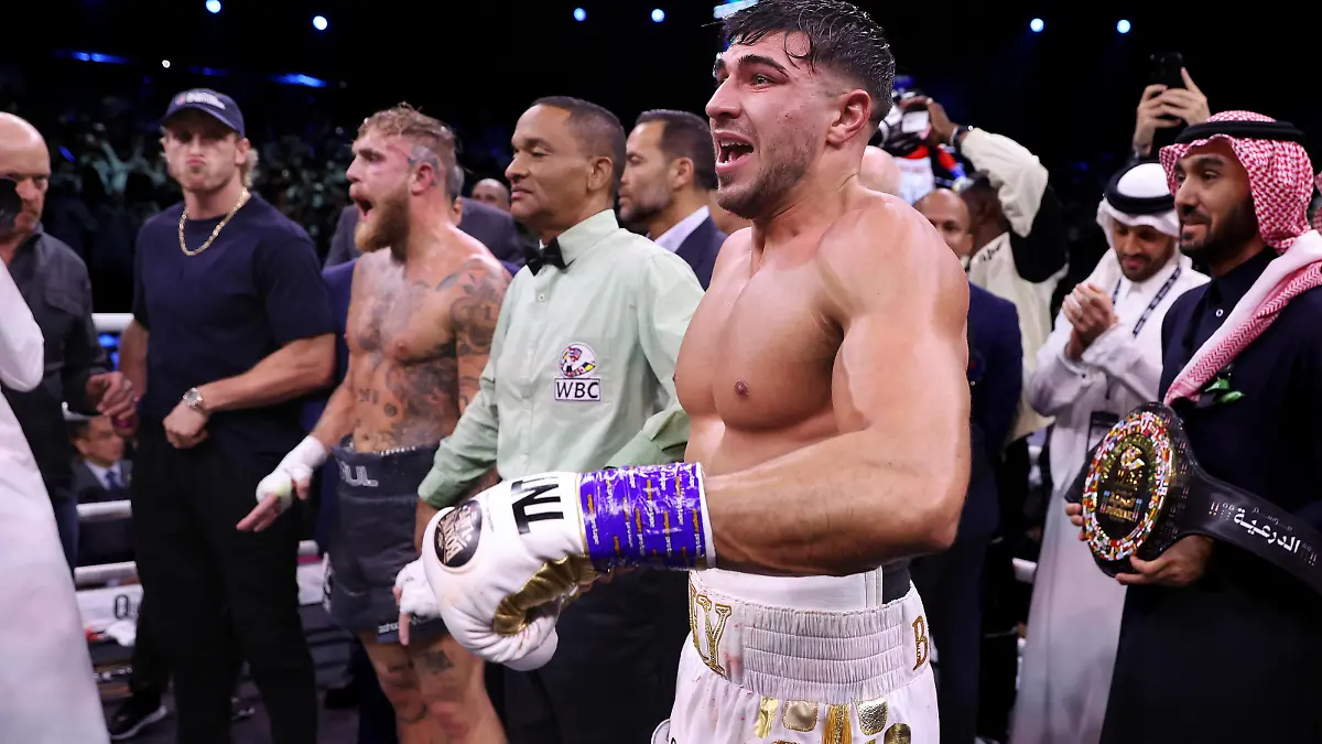 RIYADH, SAUDI ARABIA - FEBRUARY 26: Tommy Fury celebrates as the result declares them the victor as Jake Paul looks dejected after the Cruiserweight Title fight between Jake Paul and Tommy Fury at the Diriyah Arena on February 26, 2023 in Riyadh, Saudi Arabia. (Photo by Francois Nel/Getty Images)