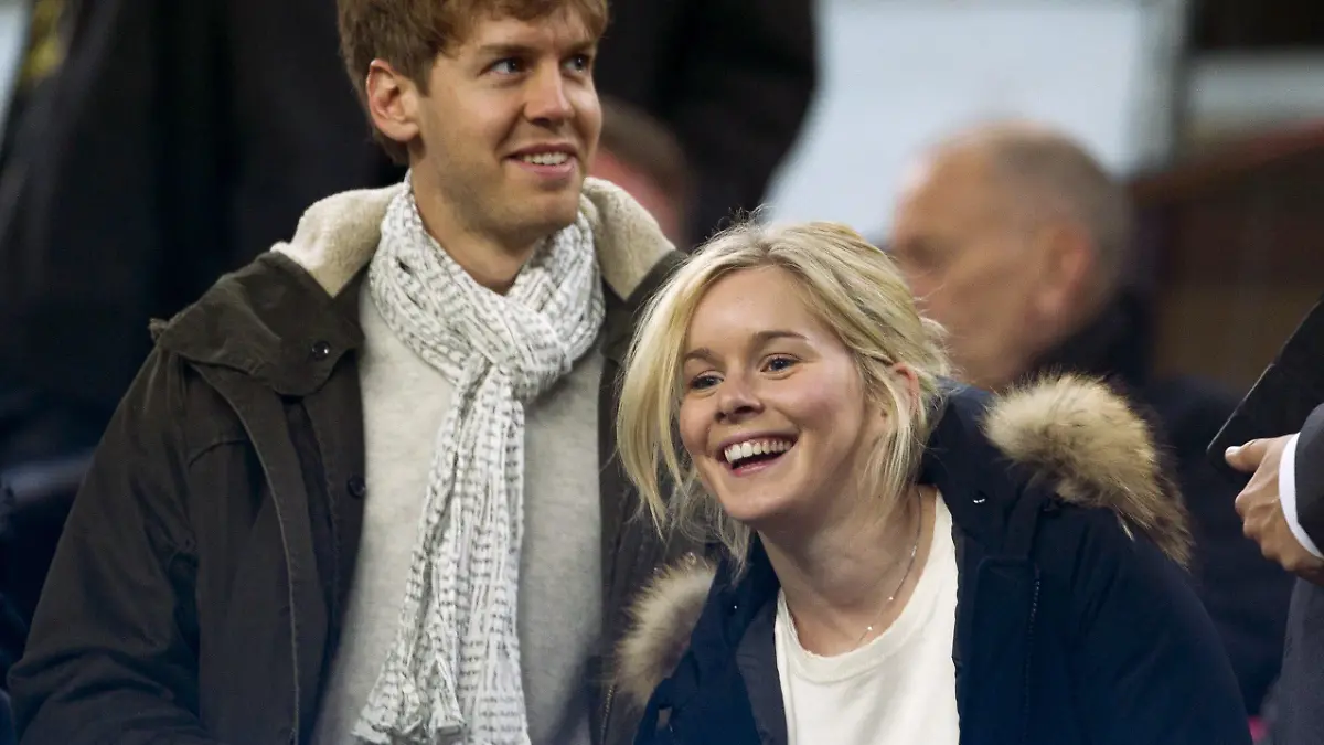 German Formula One pilot Sebastian Vettel and his girlfriend Hanna Prater arrive to the Spanish Primera Division soccer match FC Barcelona versus Valencia CF at Camp Nou stadium, in Barcelona, northeastern Spain, on 19 February 2012.EFE/Alejandro Garcia