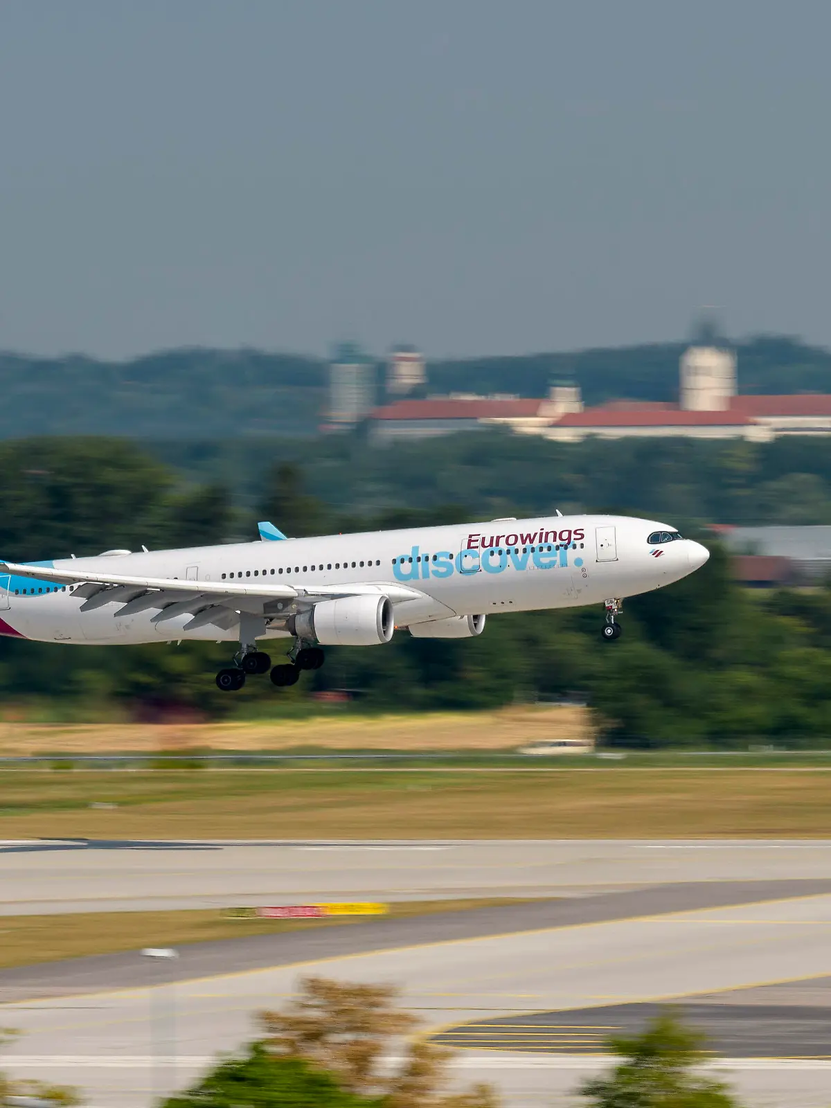 Eurowings Discover Airbus A330-203 With The Aircraft Registration D-AXGB On Approach To The Northern Runway 08L Of The Munich Airport MUC EDDM