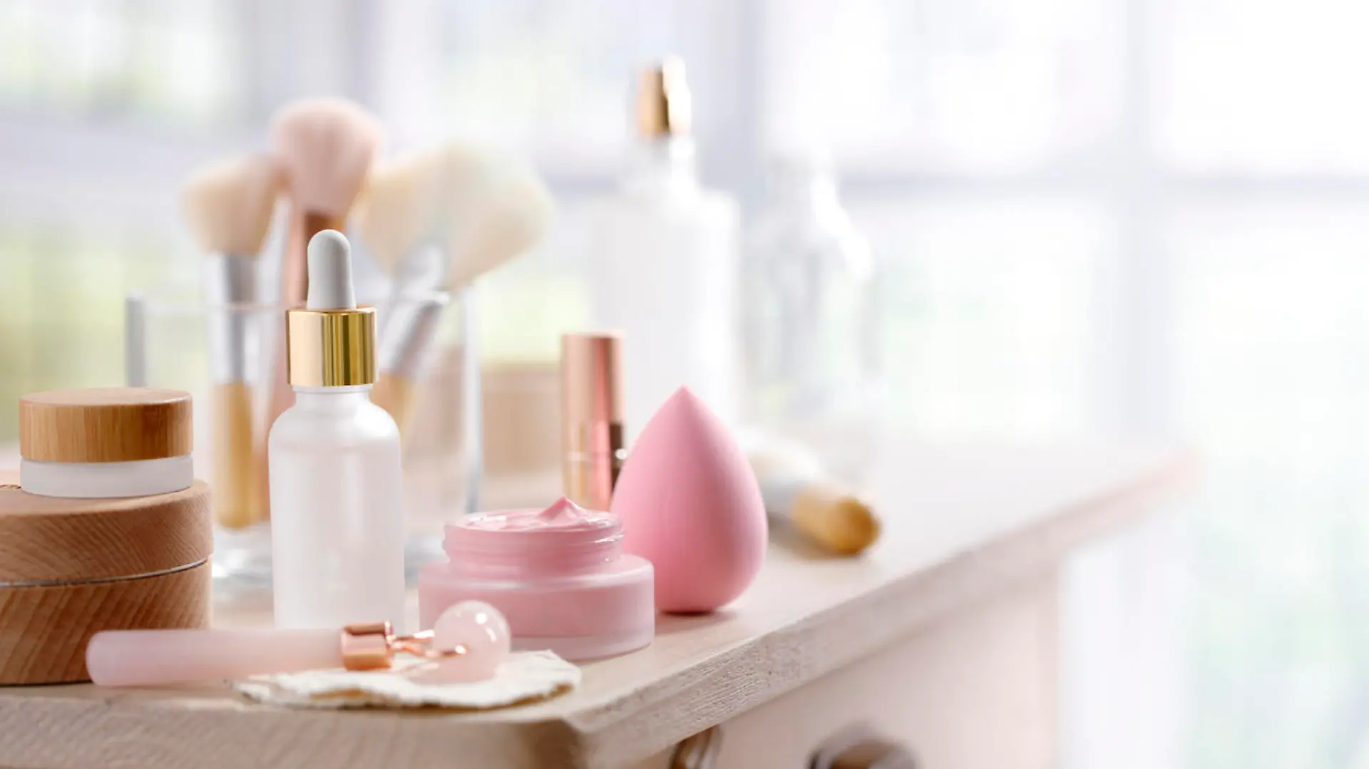 Little rustic table with skin care and make-up equipment