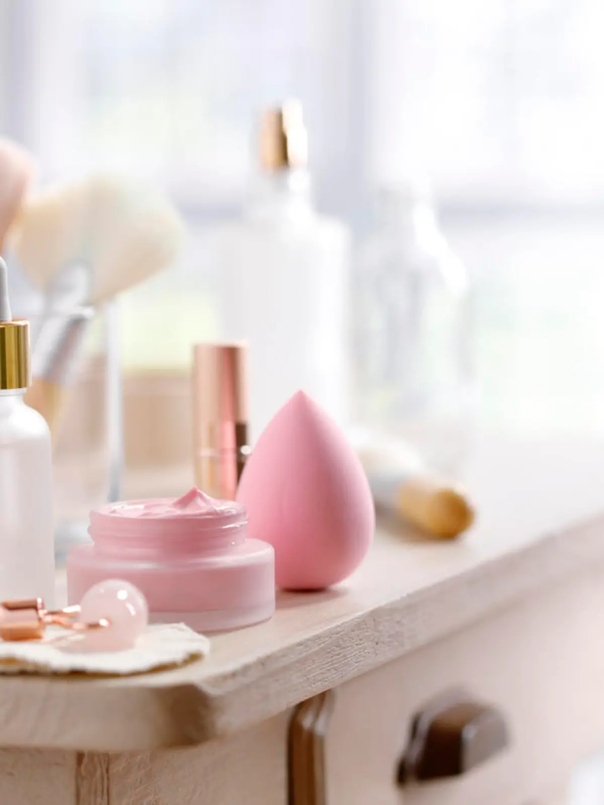 Little rustic table with skin care and make-up equipment