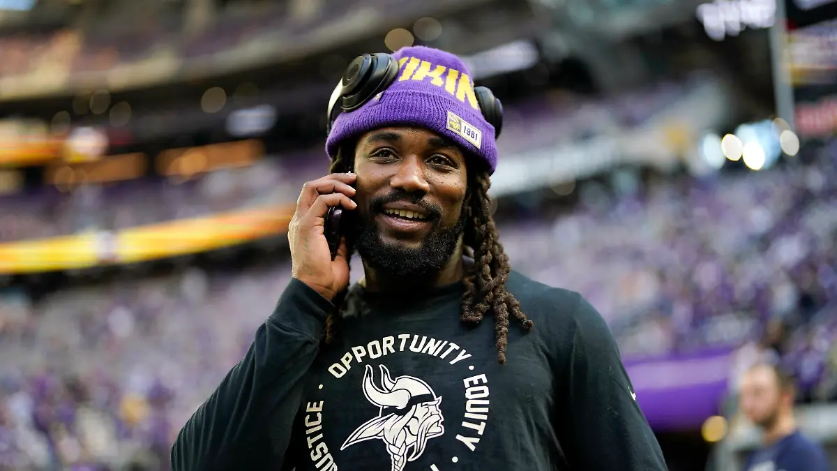 FILE - Minnesota Vikings running back Dalvin Cook stands on the field before an NFL wild card playoff football game against the New York Giants, Sunday, Jan. 15, 2023, in Minneapolis. Free agent running back Dalvin Cook is scheduled to visit with the New York Jets this weekend, according to a person with knowledge of the situation. The former Minnesota Vikings star, who turns 28 in August, could join a revamped Jets offense led by quarterback Aaron Rodgers and coordinator Nathaniel Hackett. (AP Photo/Charlie Neibergall, File)