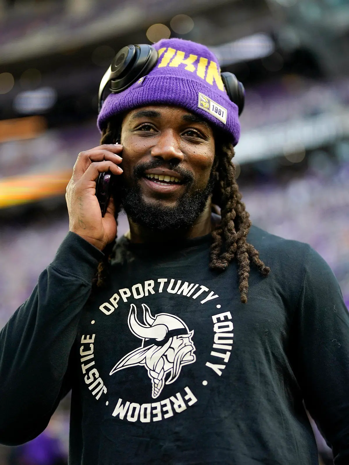 FILE - Minnesota Vikings running back Dalvin Cook stands on the field before an NFL wild card playoff football game against the New York Giants, Sunday, Jan. 15, 2023, in Minneapolis. Free agent running back Dalvin Cook is scheduled to visit with the New York Jets this weekend, according to a person with knowledge of the situation. The former Minnesota Vikings star, who turns 28 in August, could join a revamped Jets offense led by quarterback Aaron Rodgers and coordinator Nathaniel Hackett. (AP Photo/Charlie Neibergall, File)