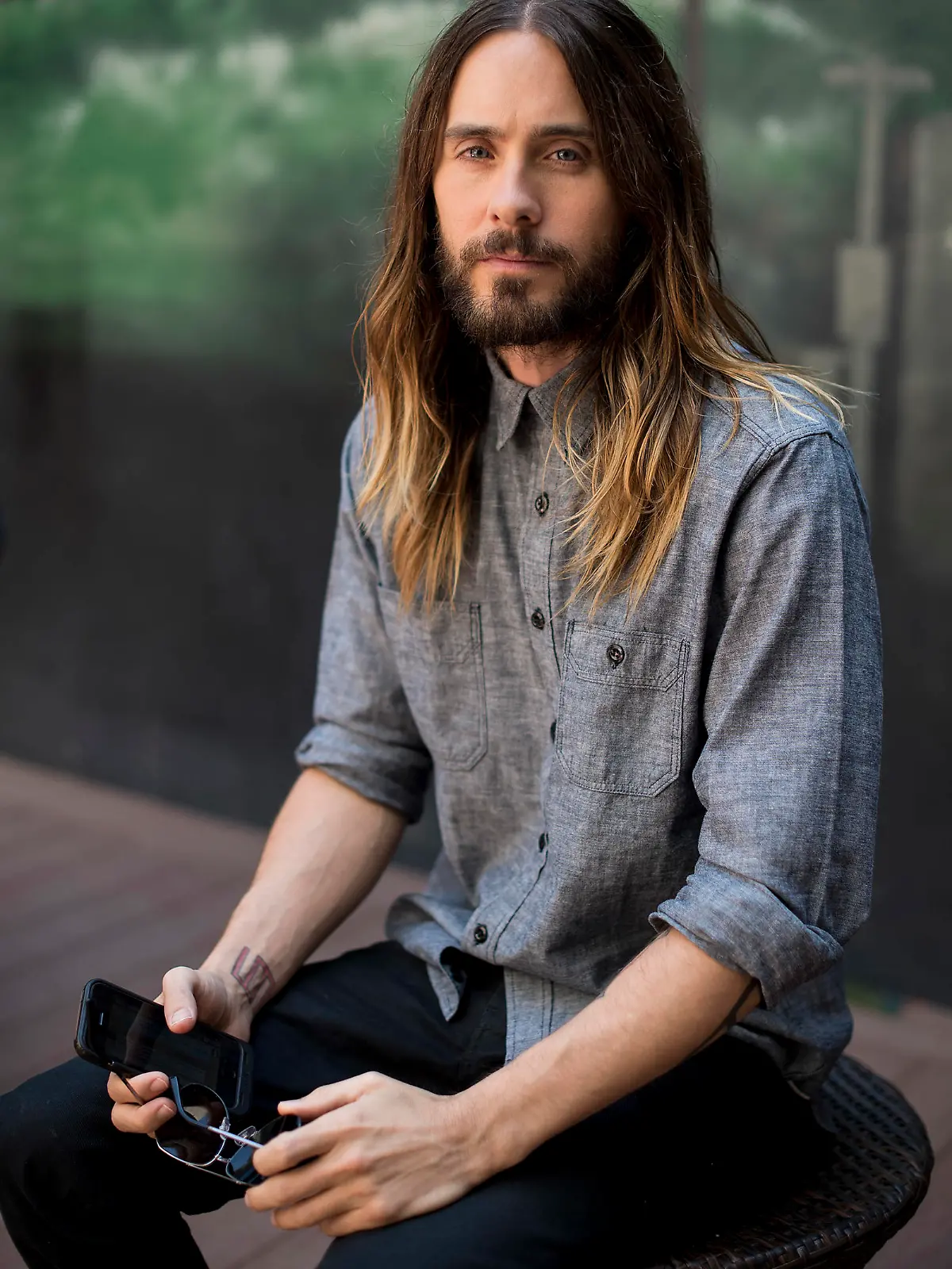 Jared Leto poses for a portrait during a press junket to promote his documentary film, "Artifact," at the BLVD Hotel on Wednesday, April 16, 2014 in Studio City, Calif. The film directed by Leto (as Bartholomew Cubbins) premieres on VH1 and Palladia on Saturday, April 26, 2014. (Photo by Jordan Strauss/Invision/AP)