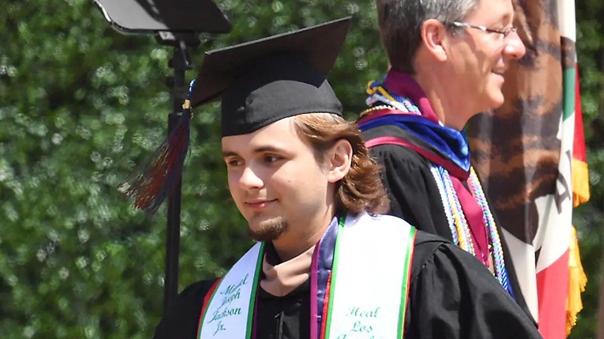 EXCLUSIVE: Prince Jackson graduates from college wearing a cap and gown with a tribute to his late father Michael Jackson written on it while his grandma Katherine Jackson looks on supporting him at his graduation ceremony at Loyola Marymount University in L.A. on Saturday. Prince wore a scarf with his full first name embroidered "Michael Joseph Jackson" on one side and an inspiring quote by his father Michael Jackson on the other side which read "In a world filled with hate we must still dare to hope. In a world filled with anger we must still dare to comfort. In world filled with despair we must still dare to dream. In a world filled with mistrust we must still dare to Believe. - Michel Jackson"
Pictured: Prince Jackson
Ref: SPL5088761 110519 EXCLUSIVE
Picture by: Garrett A. Cheen (F) / SplashNews.com
Splash News and Pictures
Los Angeles: 310-821-2666
New York: 212-619-2666
London: 0207 644 7656
Milan: 02 4399 8577
photodesk@splashnews.com
World Rights