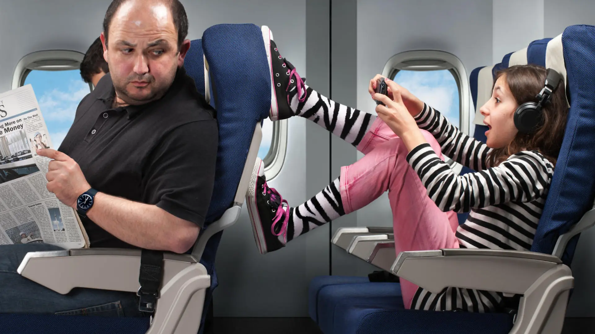 A carefree young girl annoying the passenger infront by pushing his seat.